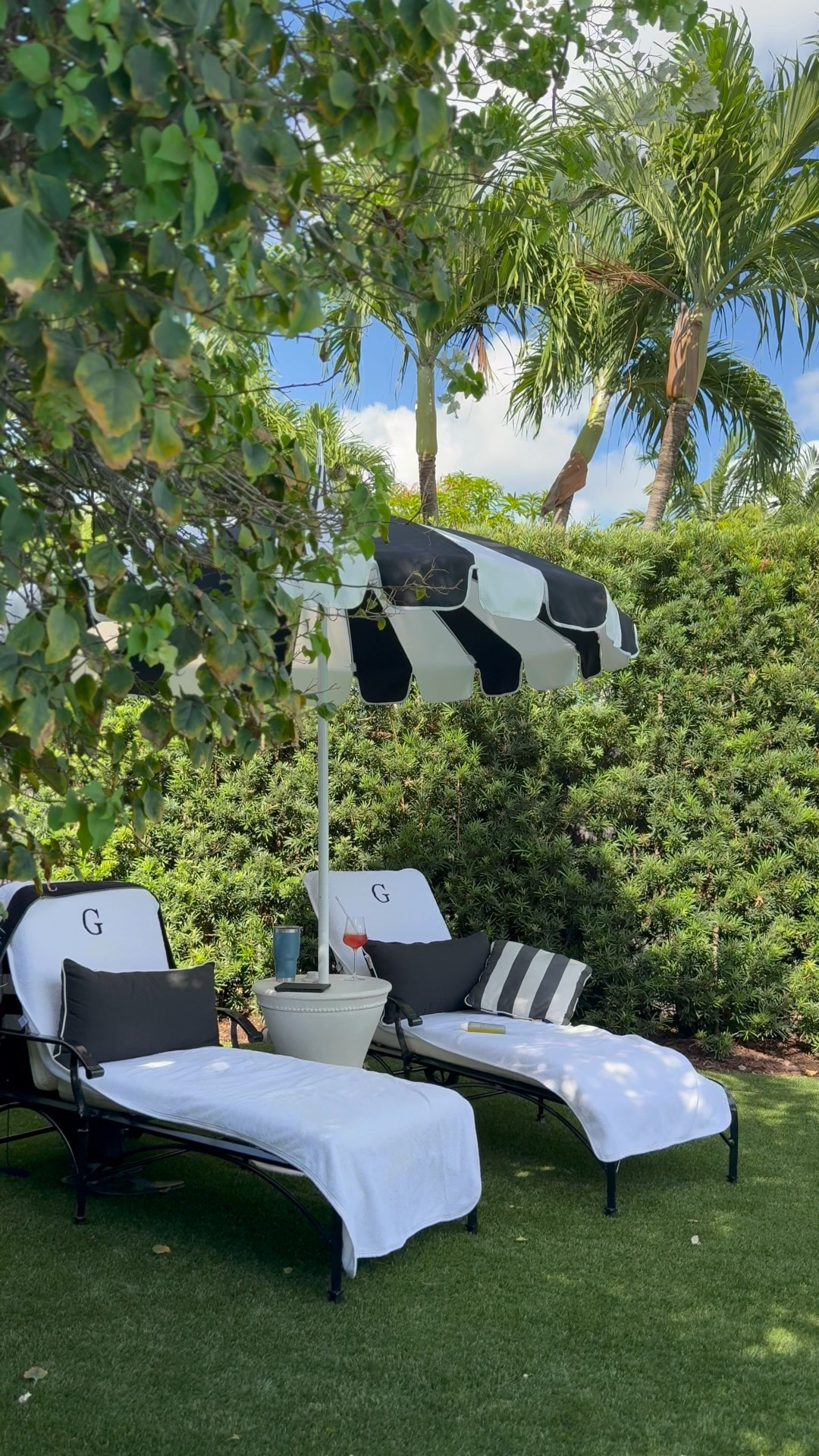 Love our poolside lounge setup for summer. A chic striped pagoda umbrella and hotel-inspired monogram pool towels. The side table/umbrella stand combo pulls the space together with functional style - shop now to enjoy MDW sales. 

#LTKSummerEdit #LTKHome #LTKSeasonal