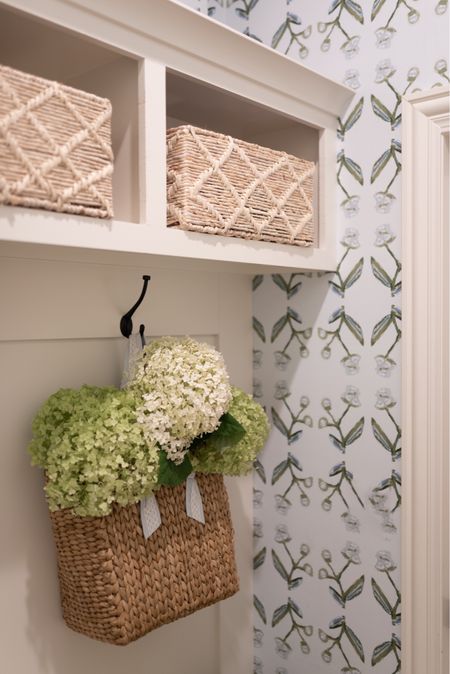 Mudroom transformation with Erin Tice wallpaper! Adore these trellis baskets for extra storage! I also linked my Pamela Munson purse! 