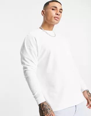 ASOS DESIGN oversized long sleeve waffle t-shirt with pocket and seam detail in white | ASOS (Global)