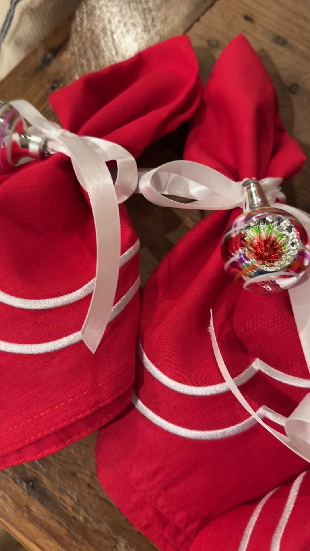 Beautiful, red and white napkins tied with Shiny Brite ornaments. What’s not to love!?

#LTKGiftGuide #LTKHoliday #LTKdayinmylife