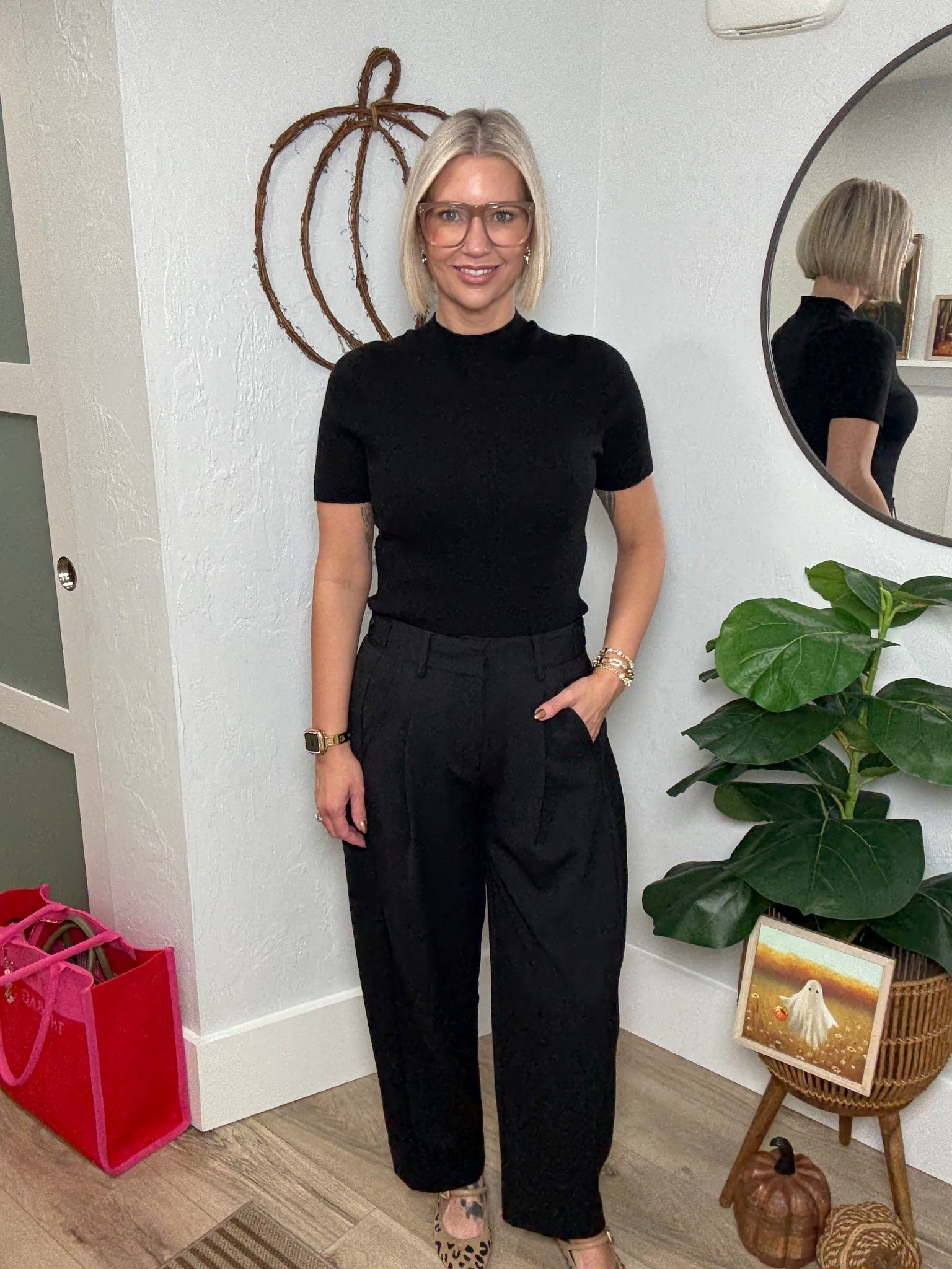 An all black moment is never a bad idea! 

This lightweight mock neck sweater is from Arach & Cloz found on Amazon. Makes for a great staple piece that can be easily layers. Available in other colors, I’m wearing a medium. 

My pants are the barrel leg trousers from the Scoop brand at Walmart. They have a fun pleating down the side giving them an elevated look. They also have an adjustable waist band as well allowing you to customize your sizing. Definitely size down, I’m wearing a 4. 

#LTKStyleTip #LTKOver40 #LTKWorkwear