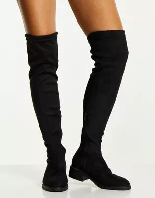Truffle Collection mid heel stretch over the knee boots in black | ASOS (Global)