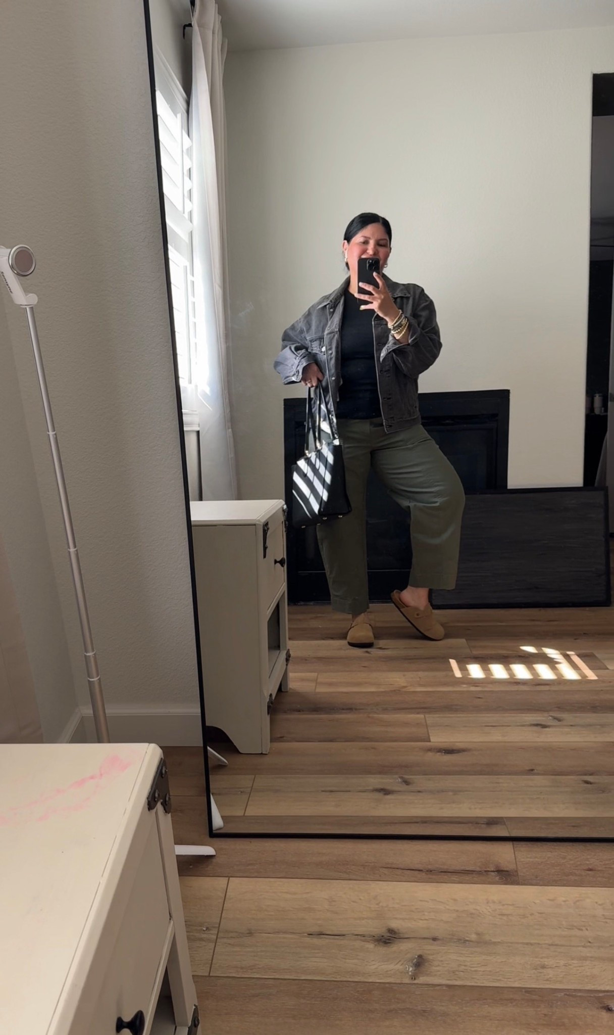 wearing a large in the black tank and denim jacket. 

1.  black tank  — a basic piece in my closet that builds many outfits. I have it in several colors and only $10. 

2. Levi denim jacket // I reach for this denim jacket a lot lately 🖤🩶

#curvygalapproved #5’3”size10 #ootd 

#LTKOver40 #LTKFindsUnder50 #LTKPetite