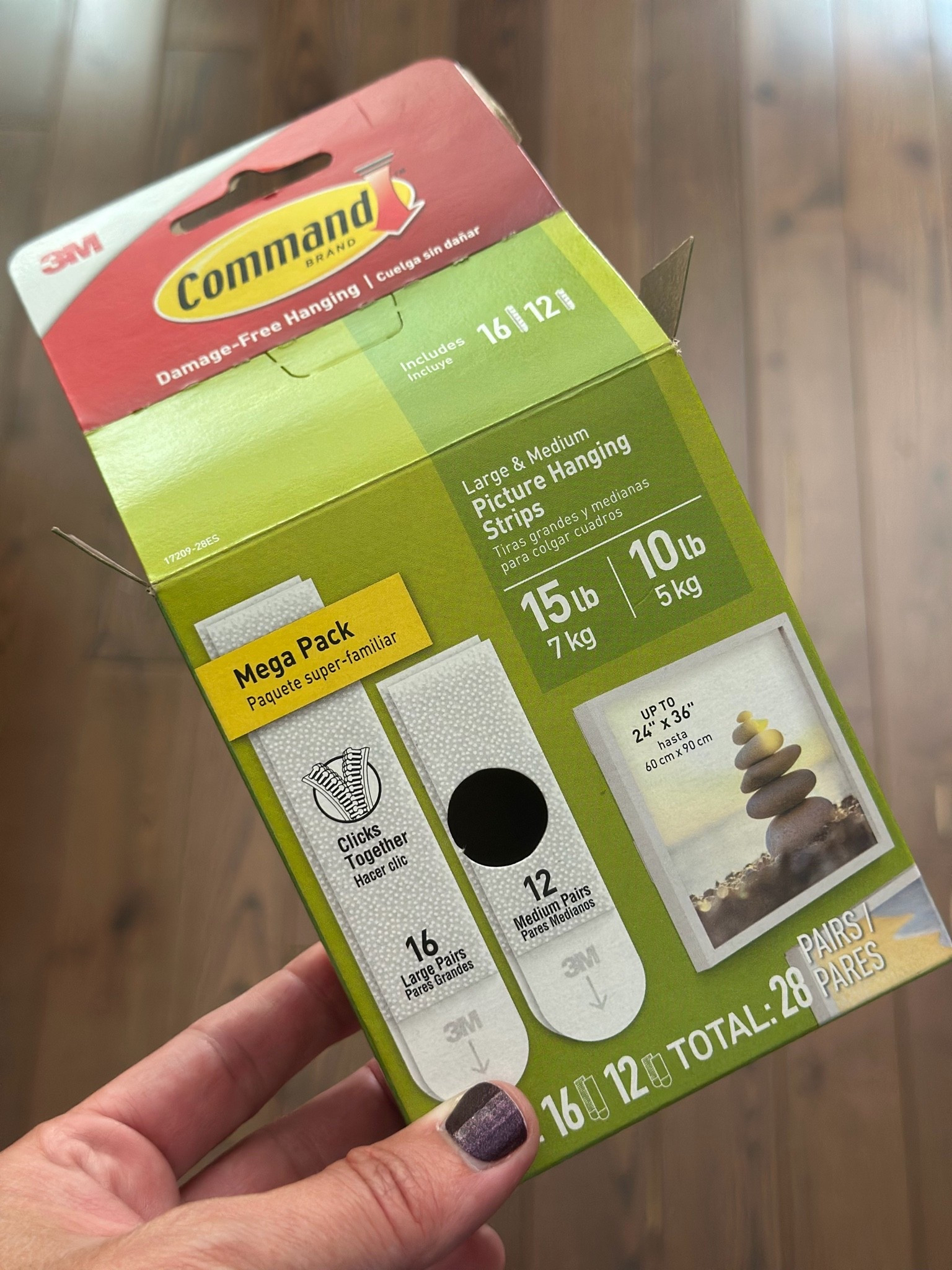 We only use Command Strips to hand any sort of art in our house. They work amazingly and leave no holes!