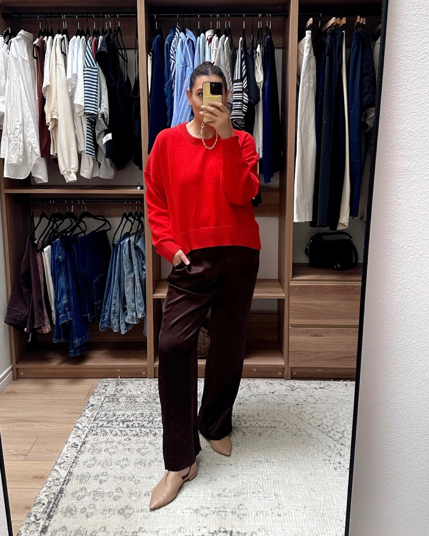 This sweater is one of my favorites for fall. It’s under $45 and it’s 100% cotton. I am in the large and it’s a very loose, relaxed fit! This one also washes out really well (I lay flat to dry) I have this in a few colors and this red is in and out of stock but I’ll link it here and you can sign up for the waitlist, if you like this color! 

Other hues I like: the chocolate brown, navy and the sapphire blue. Relaxed fit overall, stay TTS unless you want an oversized fit then go up one size. 

I'm in the large of the drawstring silk pants. They run true to size, so these are a bit loose / long on me, as intended.  

 