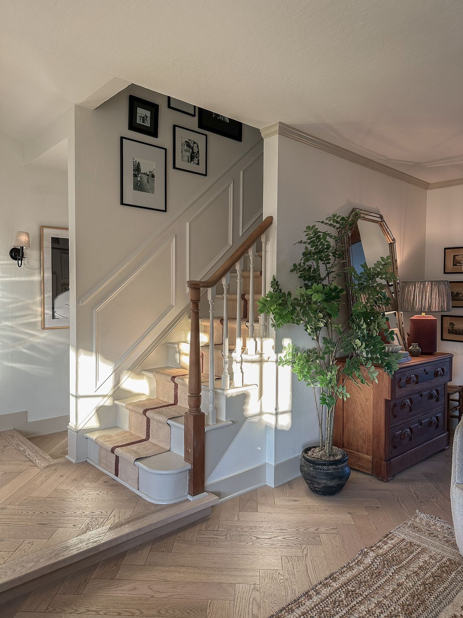 Entrance. Home decor. Faux tree. Stair runner. Runner rug. Gallery wall. Faux greenery. 

#LTKFind #LTKunder50 #LTKhome