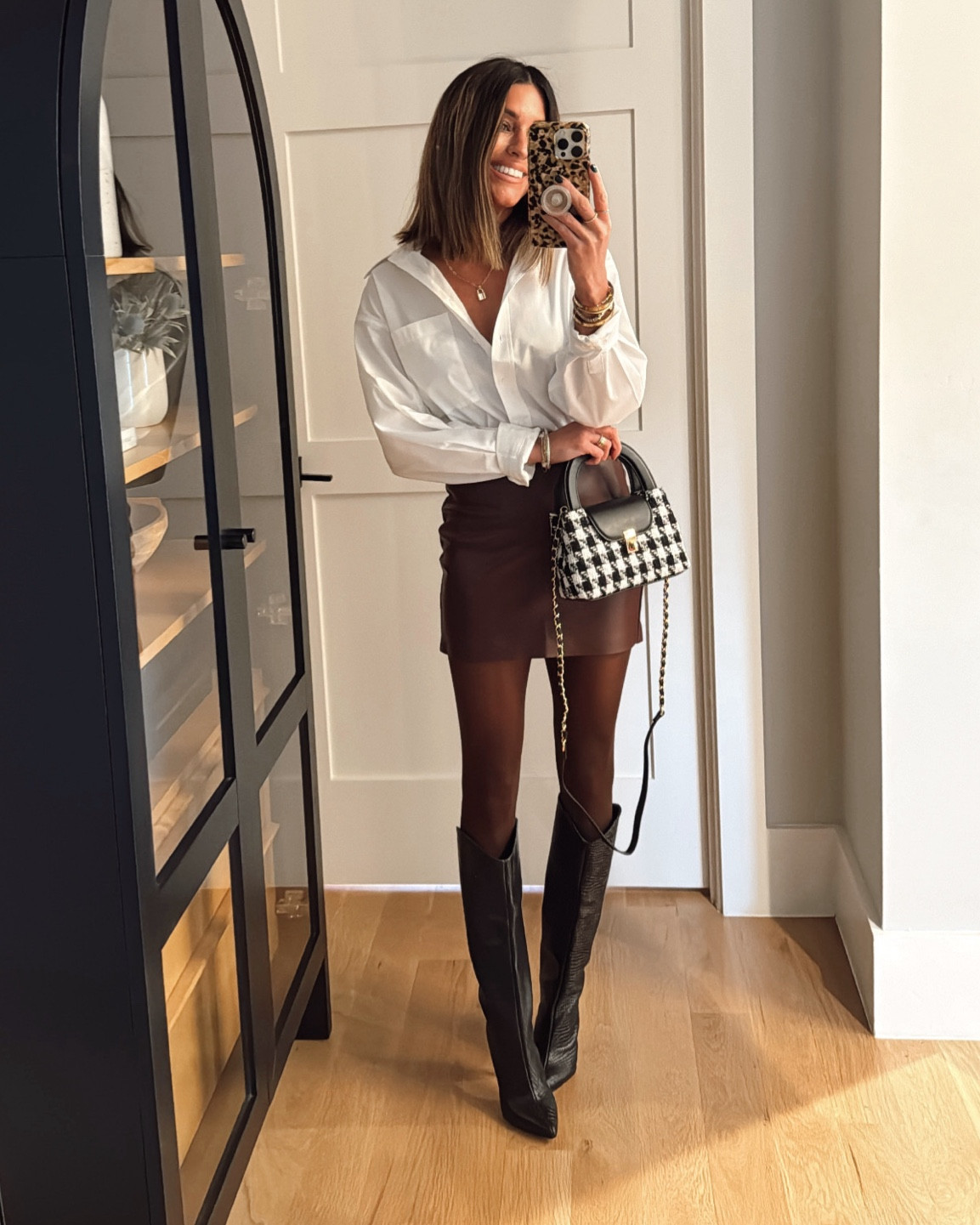 Friday happy hour vibes 🍷 I love this skirt so much! Would also be so pretty with an oversized sweater once it’s colder out! Wearing an XS in the skirt and top. 

#LTKStyleTip #LTKFindsUnder100 #LTKFindsUnder50