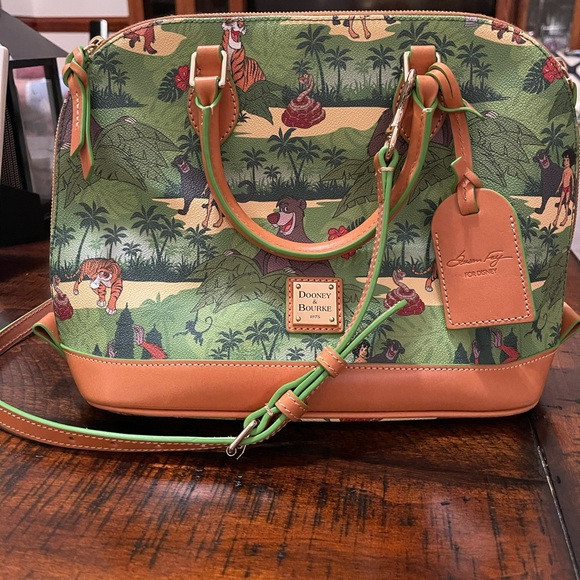 Excellent used condition/new without tags Disney jungle book Dooney and Bourke | Poshmark