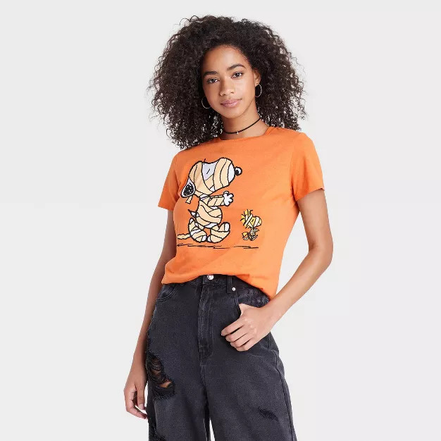 Women's Disney Snoopy Mummy Short Sleeve Graphic T-Shirt - Orange | Target