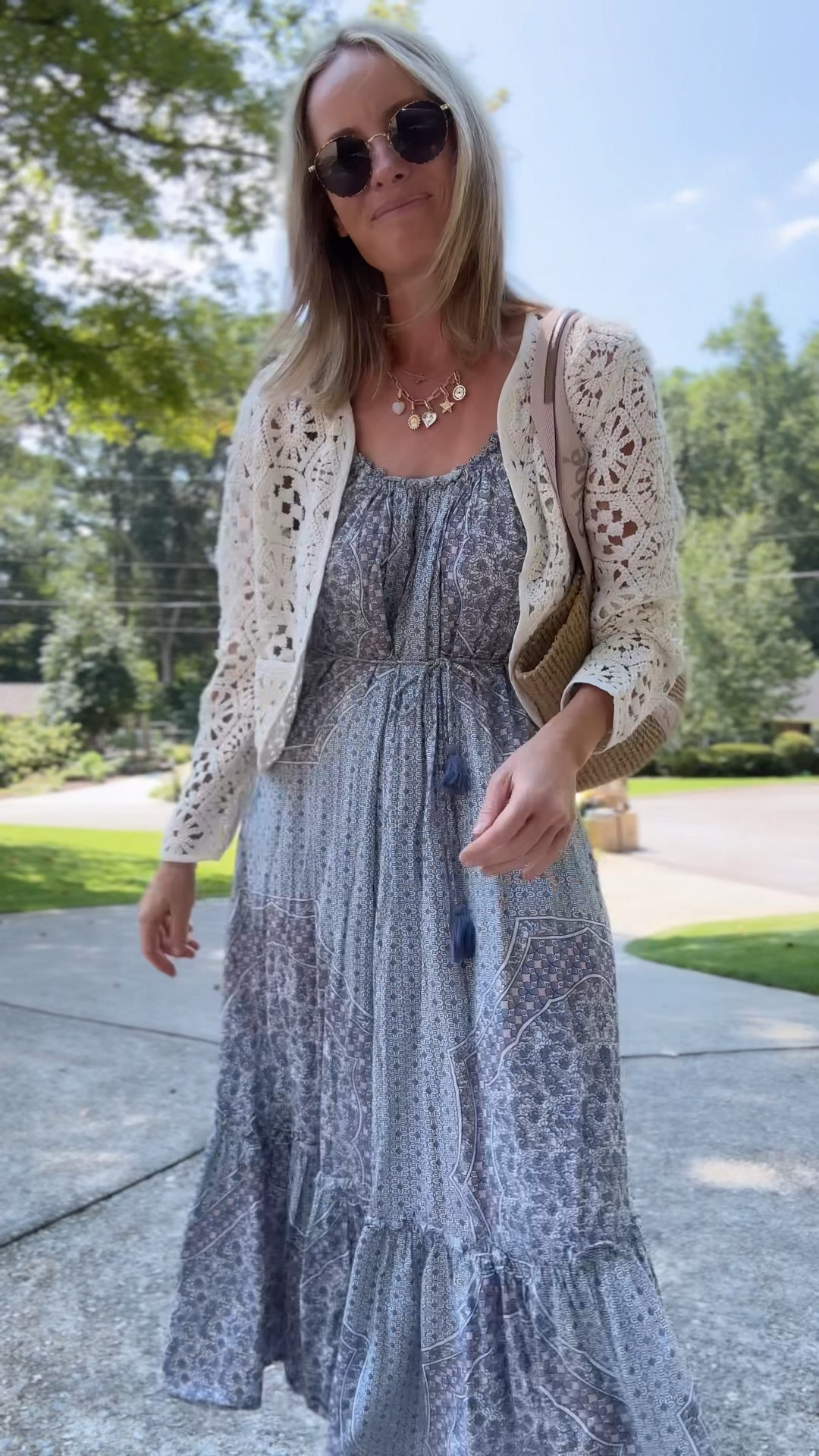 Ootd // trying to add in some fall pieces to my summer looks! This crochet sweater is a great way to extend the life of your floral summer dresses…. Since the heat isn’t going anywhere BUT mornings will soon be cooler 🫶🏻 size small! 

#LTKVideo #LTKFindsUnder100 #LTKStyleTip