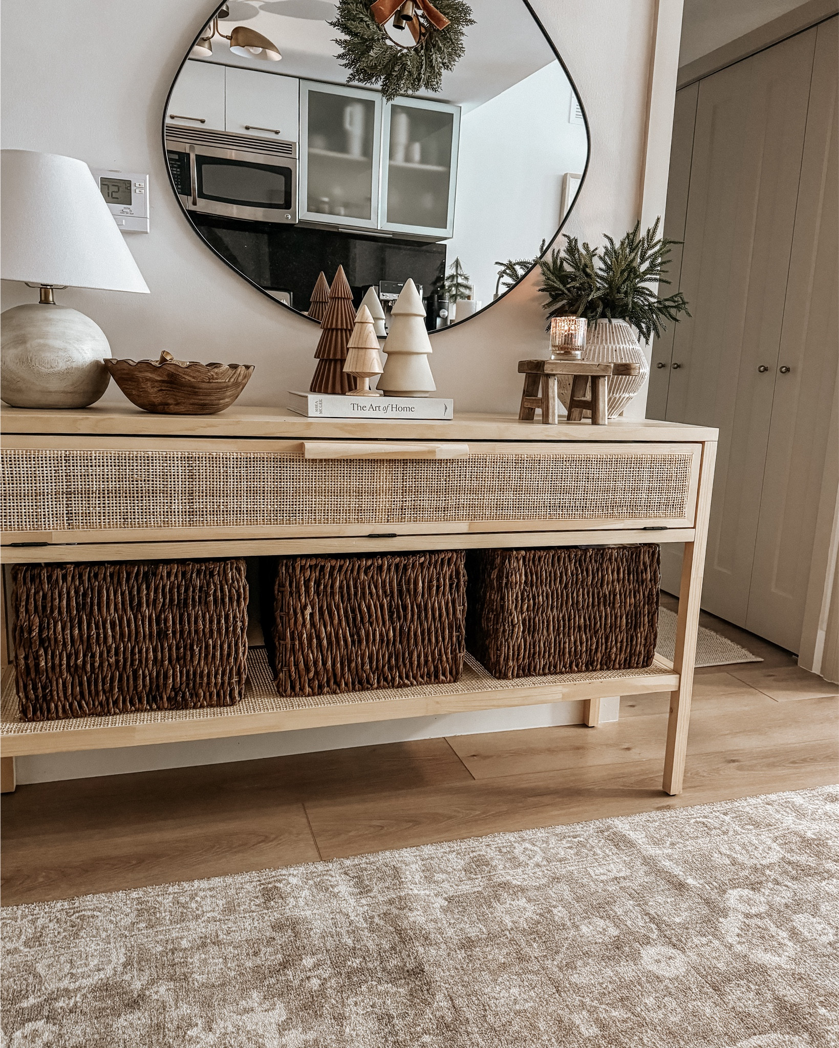 A neutral and warm holiday/christmas/winter entryway 🌲✨🦌

Neutral decor, home decor, runner rug, console table, mirror, Christmas decor, holiday decor, wreath, Christmas treee

#LTKHoliday #LTKHome #LTKSeasonal