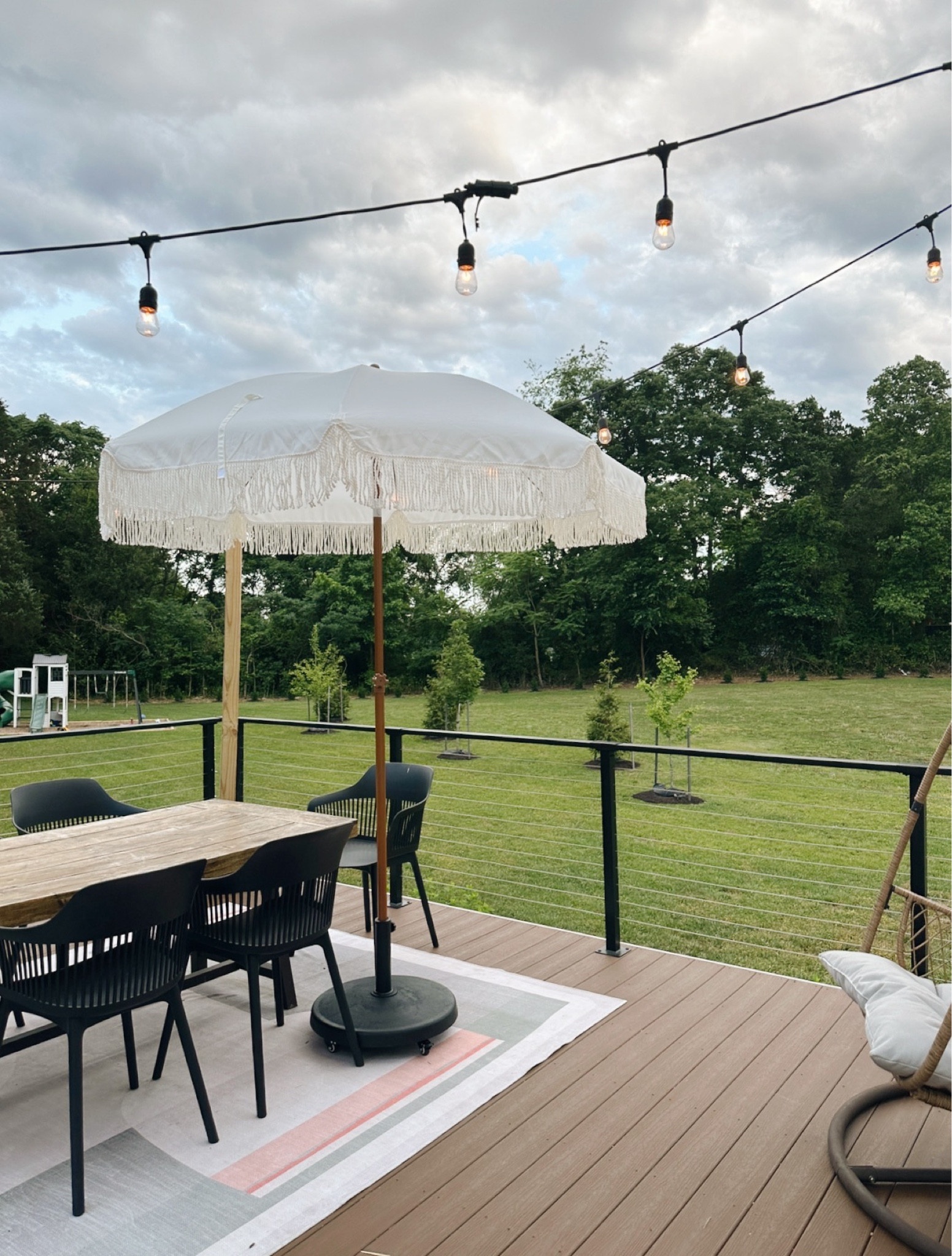 Lots of questions about our umbrella! We love the look and it has held up well against the summer storms. It’s great paired with this rolling base! ☂️☀️

#LTKHome
