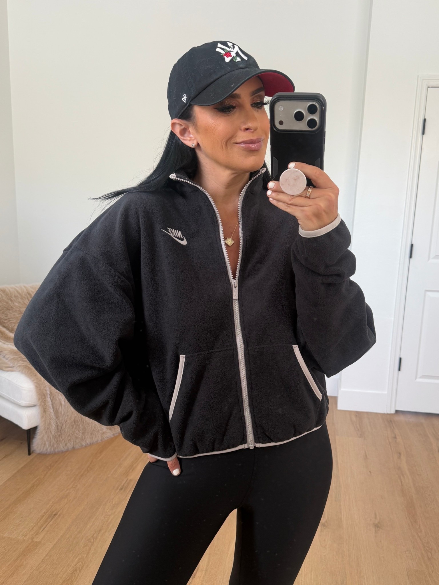  Sportswear Club Fleece Loose Cozy Track Jacket wearing size medium. 