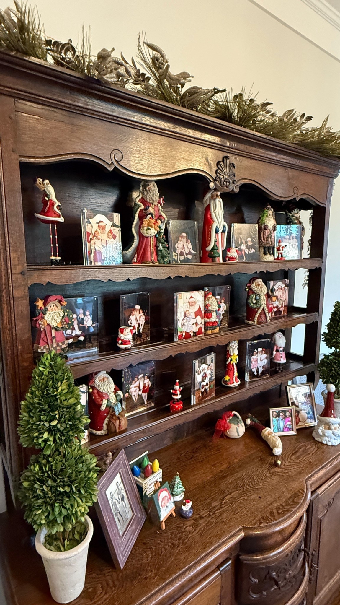 One of my favorite Christmas decorations- all the years of Santa pics in these frames surrounded by Santa’s my mom passed down and some we’ve collected over the years! 

#LTKHome #LTKKids #LTKHoliday