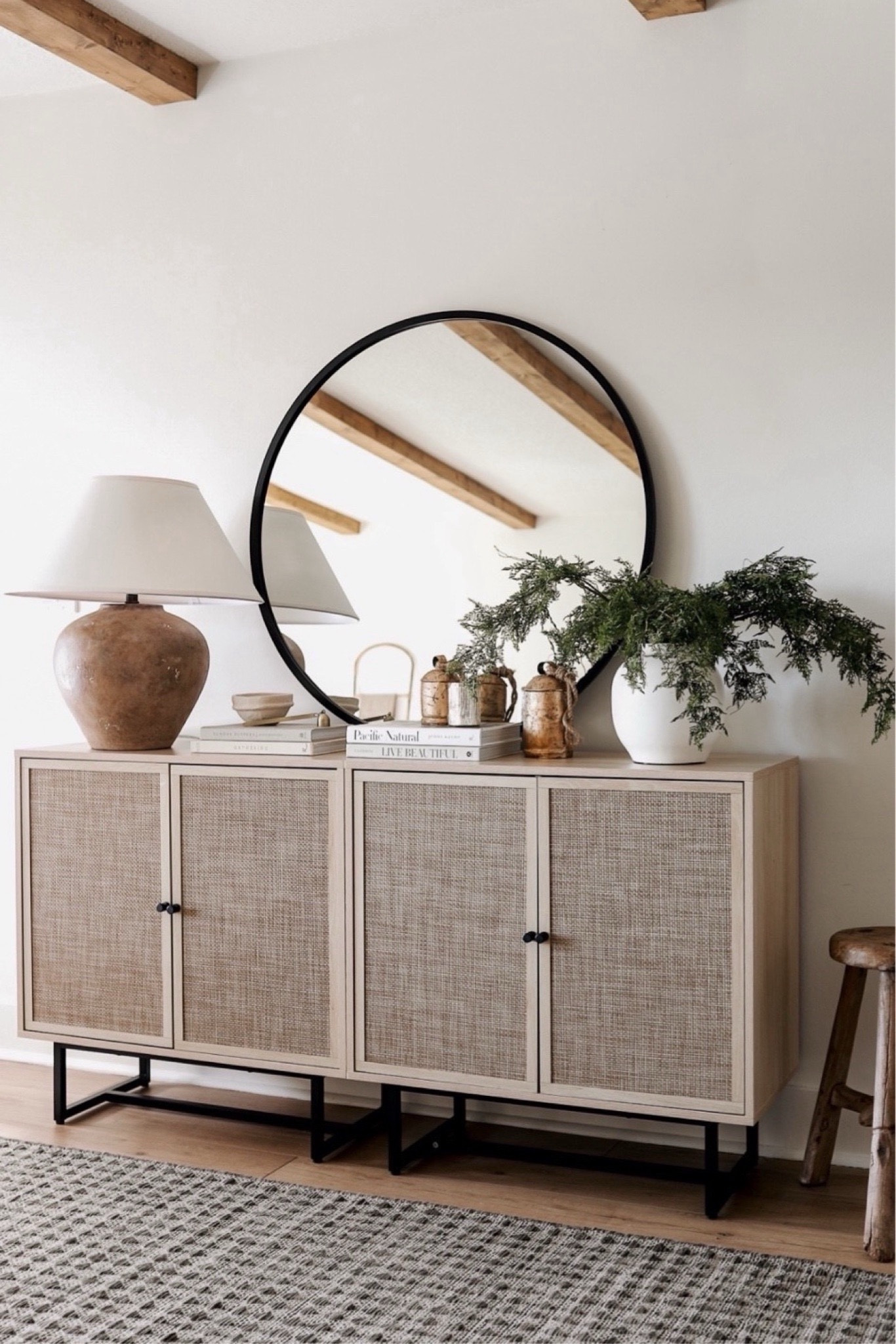 These sideboard storage cabinets we have in our entryway are on sale today for Black Friday - under $200! Linked a similar rug and greenery since these are sold out! 

#rattan #deal #cane #winter #christmas 

#LTKHome #LTKCyberWeek #LTKSaleAlert