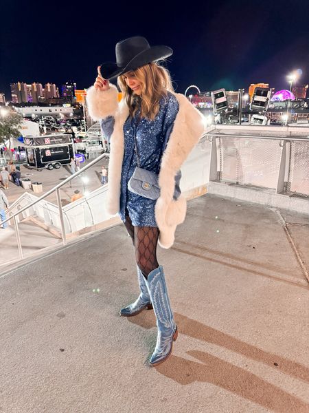 NFR look

Boots Lucchese 
Dress anthro 
Jacket show me your mumu
Hat is from Amazon 