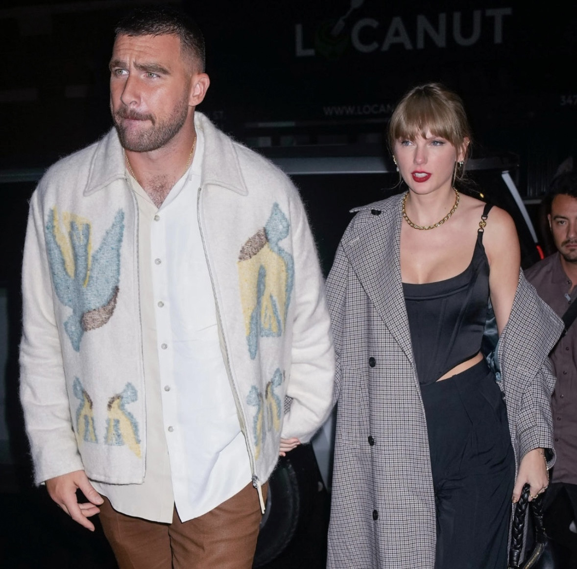 Taylor’s not the first celebrity to be spotted in this Versace satin corset top.  Swipe to see which housewife wore this before her