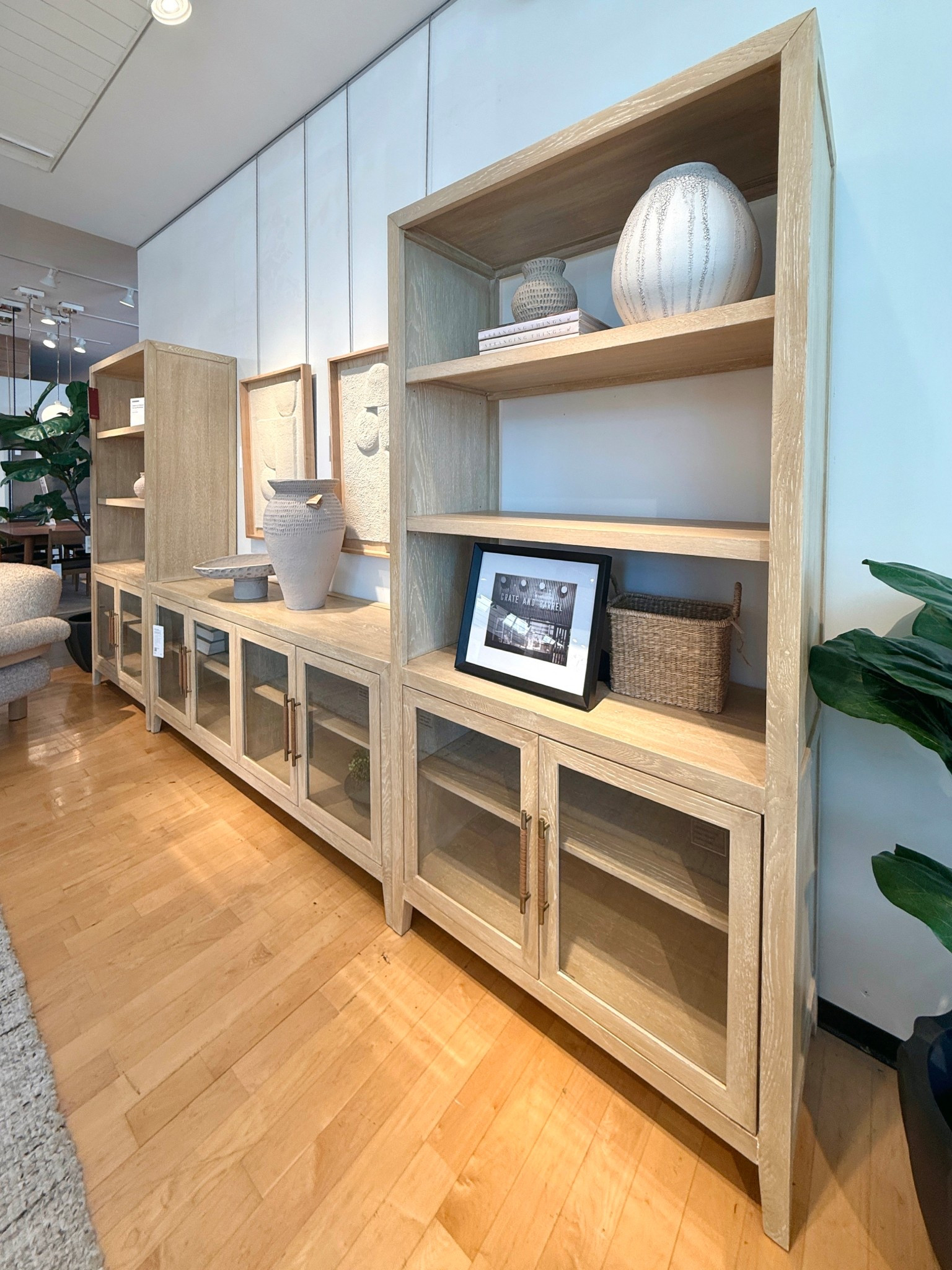 The Clairemont 147” Media Console Set from Crate & Barrel features light oak tones, a soft driftwood finish, and plenty of hidden storage—elevated yet effortless. ☺️I’ve linked this full setup along with a few similar styles worth checking out! ✨ #LivingRoomInspo #NeutralDecor #MediaConsole 

#LTKSaleAlert #LTKHome