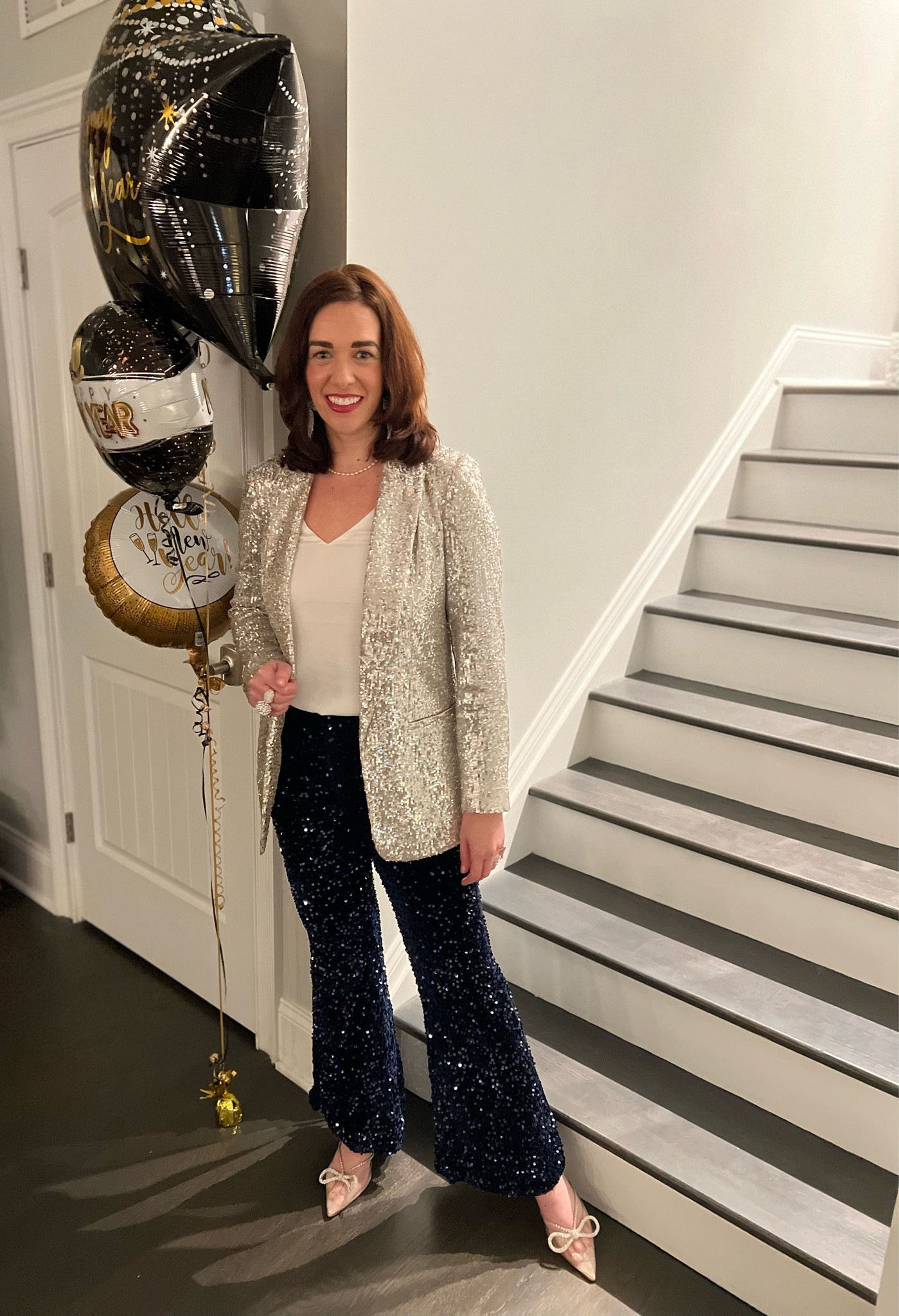 New Year’s Eve Outfit Sequin Blazer (size small/4). White cami (size extra small). Navy blue sequin flares (size small/4). Bow heels (size 8.5). #newyearsoutfit #newyearseveoutfit #sequinblazer #blazer #cami #tank #navybluepants #flares #flarepants #navyblueflares #winteroutfit NYE Outfit 

#LTKunder100 #LTKstyletip #LTKshoecrush