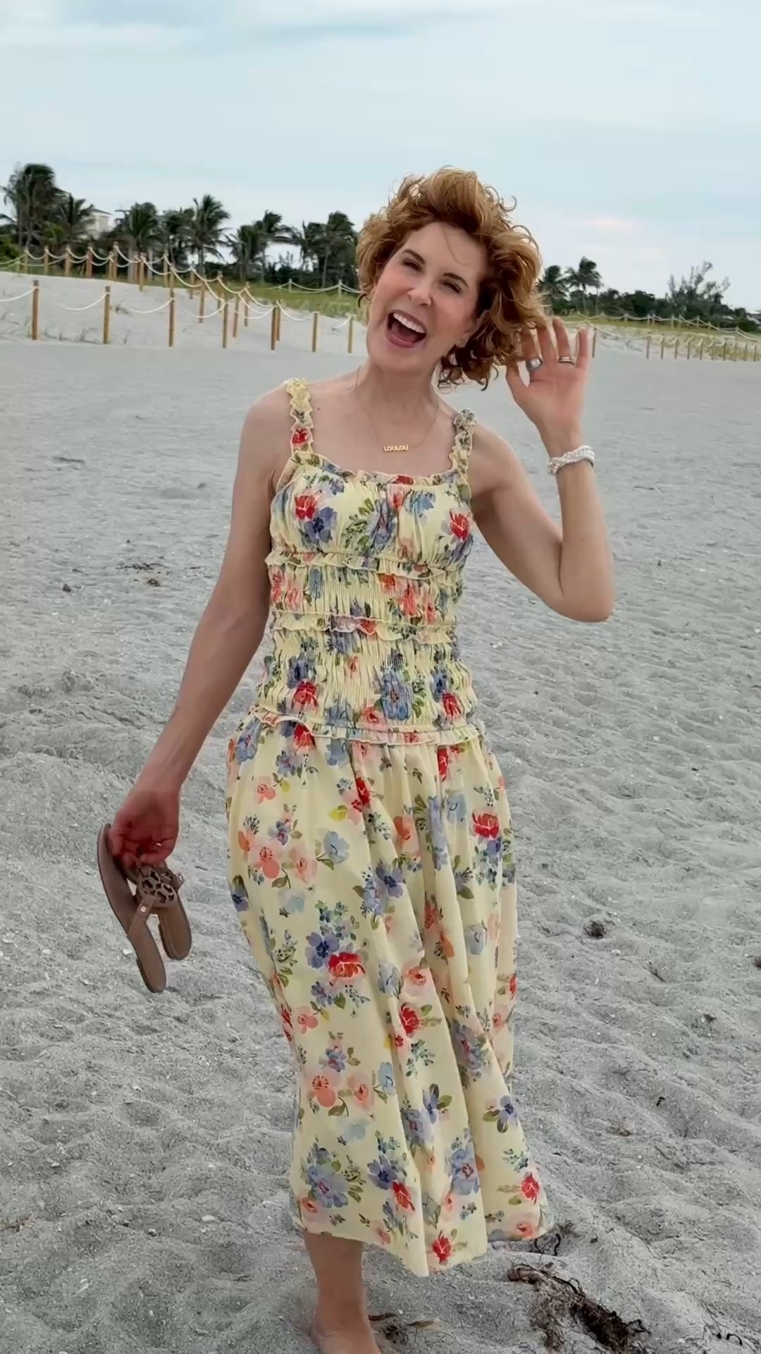 This feminine cotton midi dress is 40% off right now! The allover shirring gives it a flattering, comfortable fit, and the ruffled sweetheart neckline makes it feel extra special. I styled it with nude sandals, my beloved grandma name necklace, and my pearl Apple Watch band for a classic summer outfit.

#LTKSaleAlert #LTKOver40 #LTKTravel
