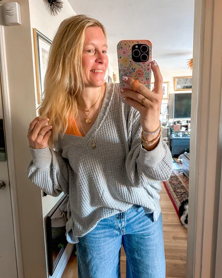 Oversized sweatshirt you can wear on or off the shoulder. I add a fun color tank underneath. 

tank large
top large
jeans 12 long 
shoes 8



#LTKSummerSales #LTKOver40 #LTKU