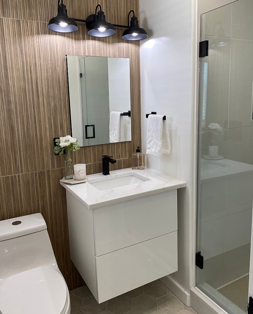 3 TIPS to making a Small Bathroom Look Larger:

1) Choose a floating vanity 
    - visibly seeing more floor space gives the illusion that the bathroom is bigger

2) Use larger tiles
    - Choose Big Slabs of stone if you can!
  - ex. Avoid tiny penny tiles- they’ll make the room feel small. 

3) Go LIGHT & BRIGHT
    - choose light natural colors: White / Cream / Tan / Light Brown / light gray …
(dark colors make a room look smaller, so avoid!)

4) Install a large mirror to reflect light!


🛁 Follow my IG & LTK @HomesWithChristina 

🛁 & please click the 🔔 above to subscribe! :)

.
.
.
.
Small bathroom renovation | Neutral bathroom inspo | vertical cane porcelain tile | pole wrap accent wall | cane tile back splash | hexagon tile | floating vanity | white bathroom 

#LTKStyleTip #LTKHome #LTKFindsUnder50