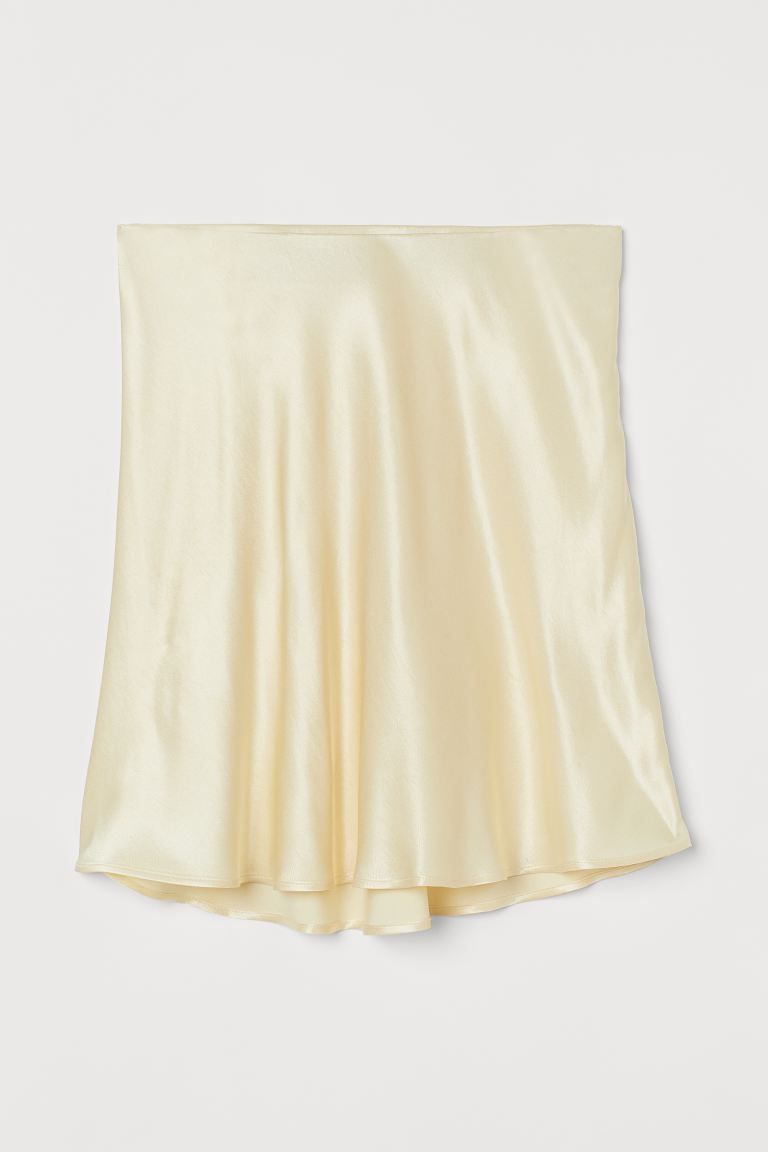 Short skirt in softly draping viscose satin with a sheen. High waist with concealed elastication ... | H&M (UK, MY, IN, SG, PH, TW, HK)