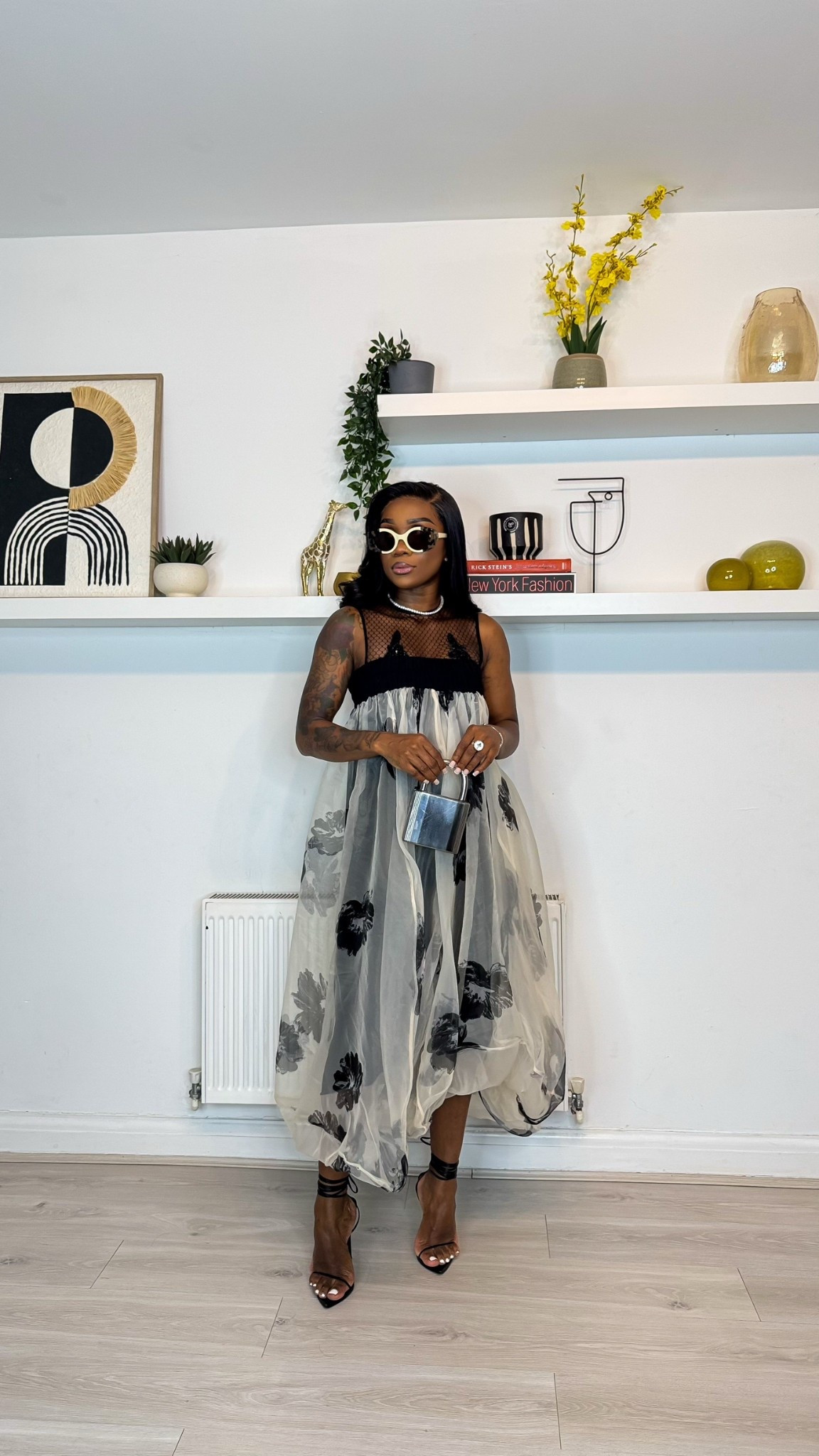 Wore this to a wedding. My husband said, “Isn’t the outfit already enough?” Me: “Apparently not, because the shades stole the spotlight.” 😎💅🏽