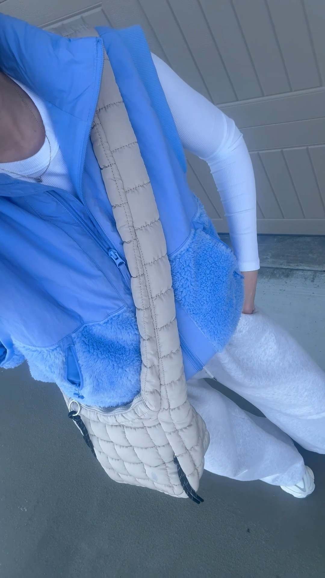 OOTD💕 the cutest on sale for just $32 right now! Comes in 3 colors! Wearing a size small, a xs long sleeve and small pants 

Outfit inspo | winter style | Target finds | fleece vest | sweatpants | quilted bag | athleisure | mom on the go 

#LTKootd