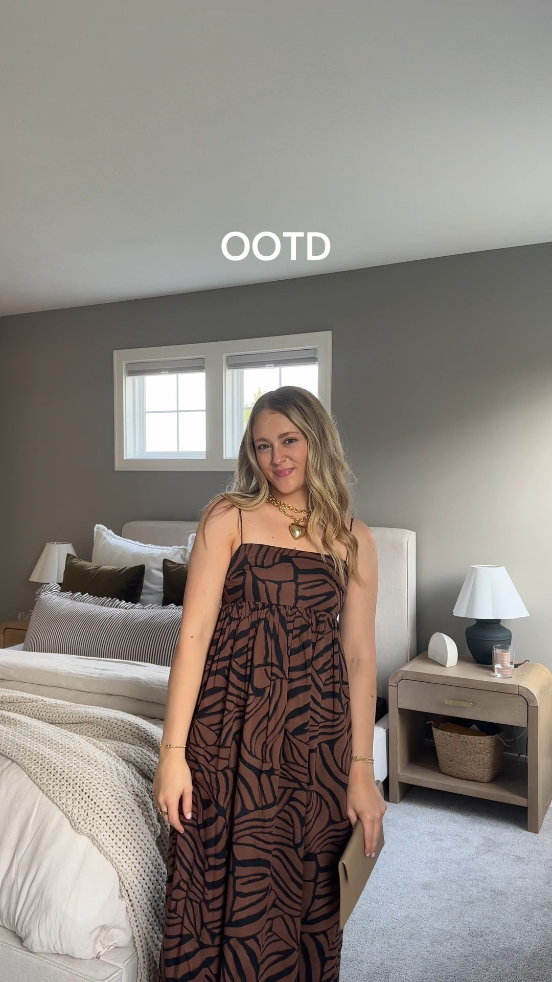 Dress is from Revolve a few years ago! It’s the Rails Black and Brown Bengal Print Dress. I wore gold wrap sandals with my outfit!