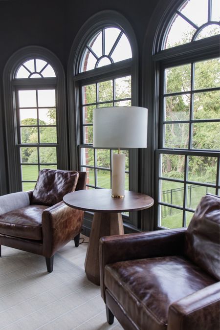 Love our leather chairs from #arhaus! Leather furniture, plaid rug, end table, accent table, alabaster lamp, home office, sitting area, 

#LTKsalealert #LTKhome #LTKfamily