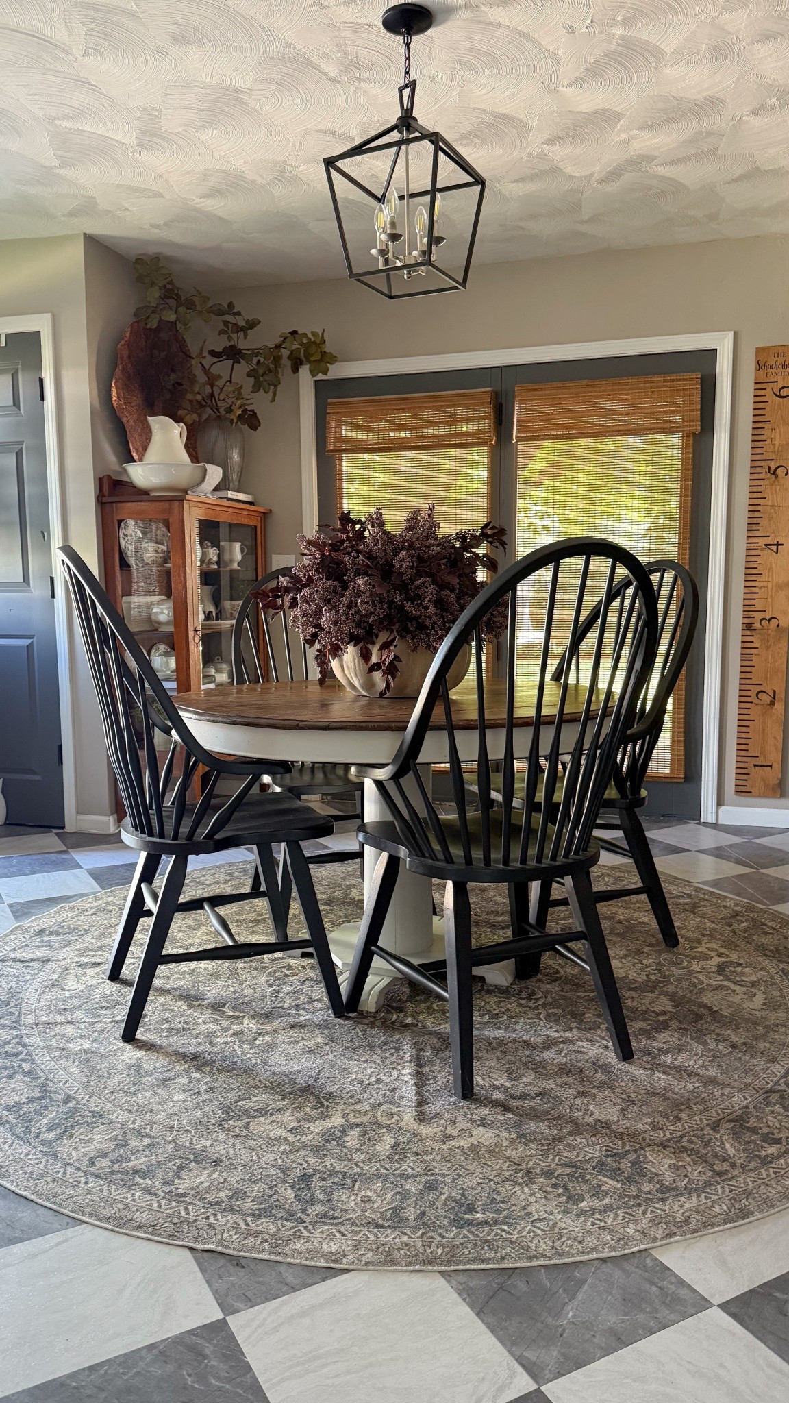 Vintage Modern Fall Dining Room 

Purple Floral Arrangement | Dining Room Centerpiece | Casual-Luxury | Fall Stems | Wooden Bamboo Blinds | Round Machine Washable Rug | Round Dining Table | Black Windsor Dining Chairs | Solid Wood Dining Chairs | Farmhouse | 

#LTKSeasonal #LTKHome