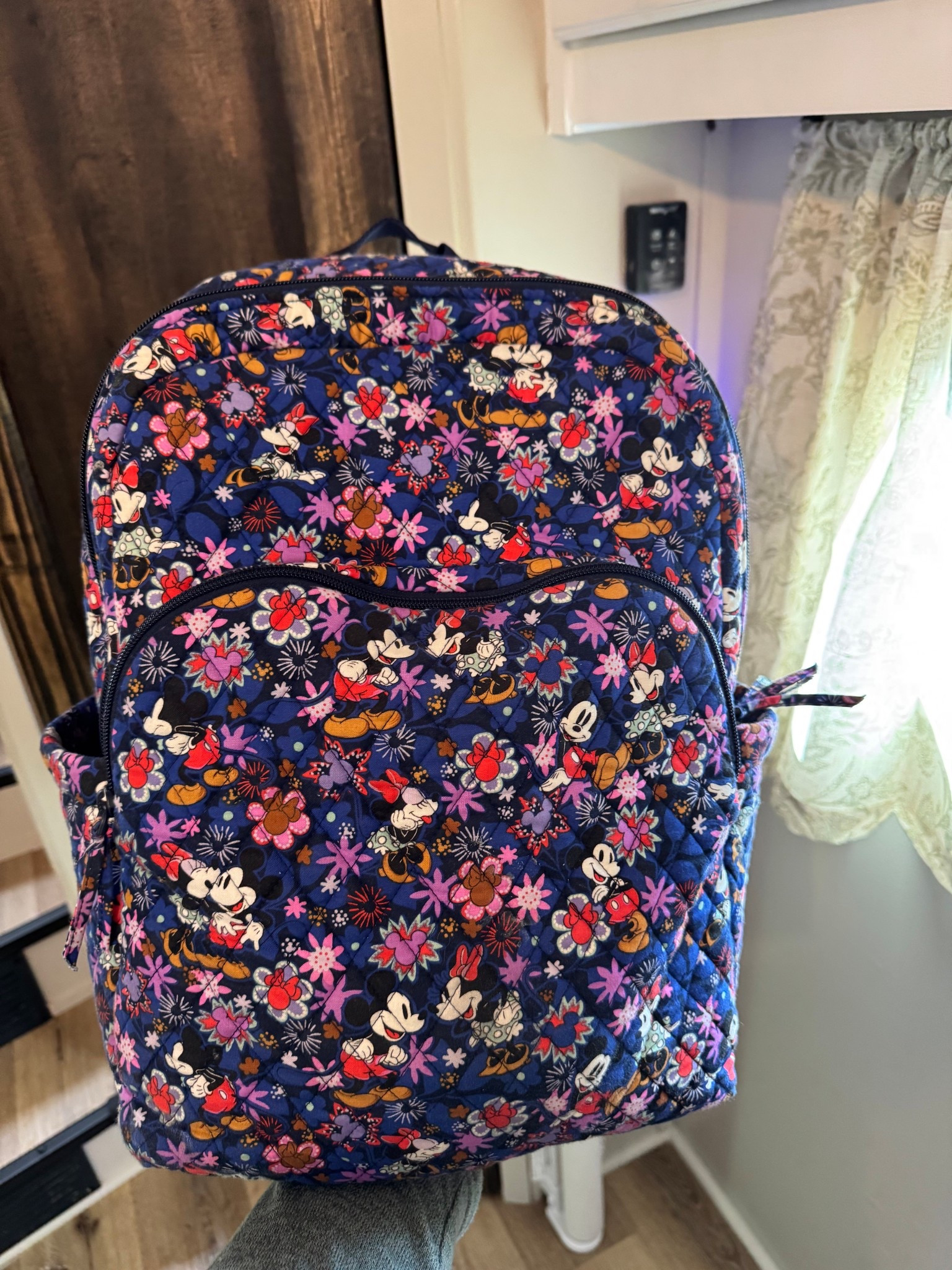 Disney Vera Bradley backpack that I use as a diaper bag! We just took a Disney trip and this was such a perfect size! 