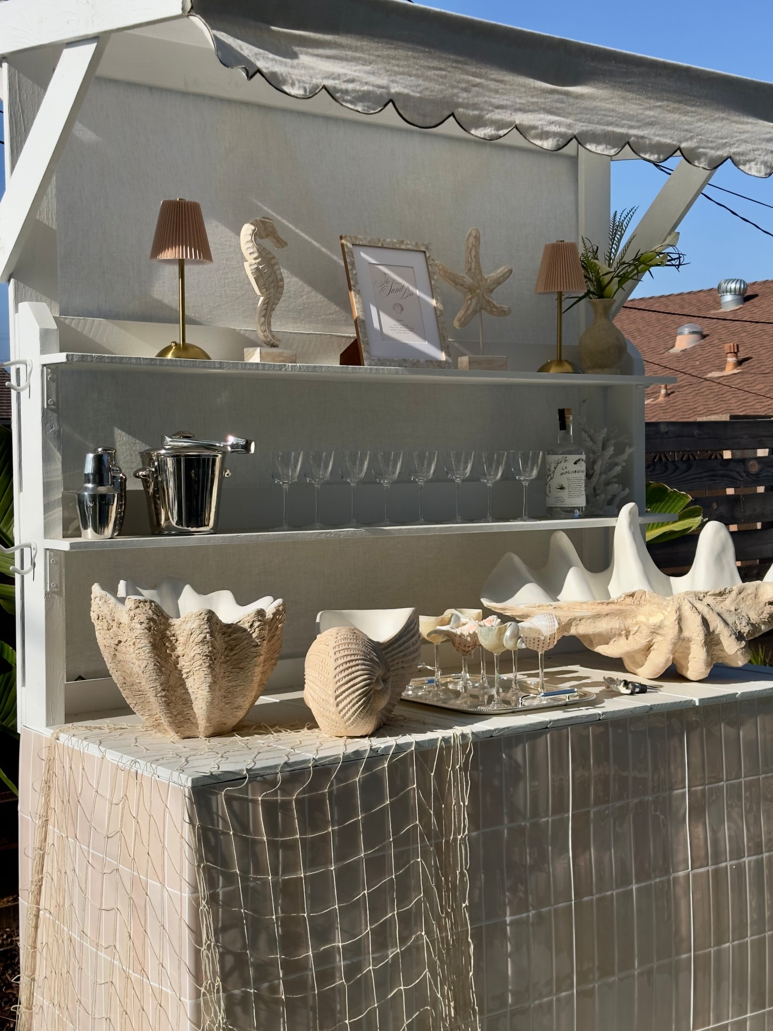 Saltwater summer dinner party 🐚🐟 Our sand bar drink station! LOVE these seashell ice buckets 

#LTKHome #LTKParties