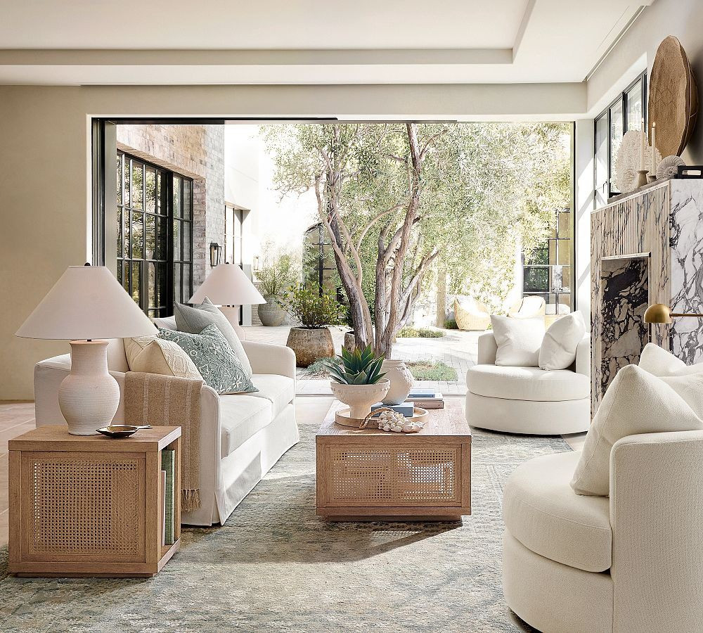 Spring refresh but make it cozy 🤍 loving this Pottery Barn setup — from the sofa to the cutest coffee table + vases, everything made my living room feel sooo gorgeous & elevated ✨🌿#PotteryBarnFinds #LivingRoomRefresh #SpringDecor #LivingRoomStyle #HomeRefresh #SofaStyle #CoffeeTable #VaseDecor #AccentChairStyle #ThrowPillows #NeutralHome #ModernHome #CozyHomeVibes #InteriorGoals #HomeInspo #AestheticLiving #CleanAesthetic #ChicDecor #PrettySpaces #DecorGoals

#LTKSeasonal #LTKHome #LTKSaleAlert