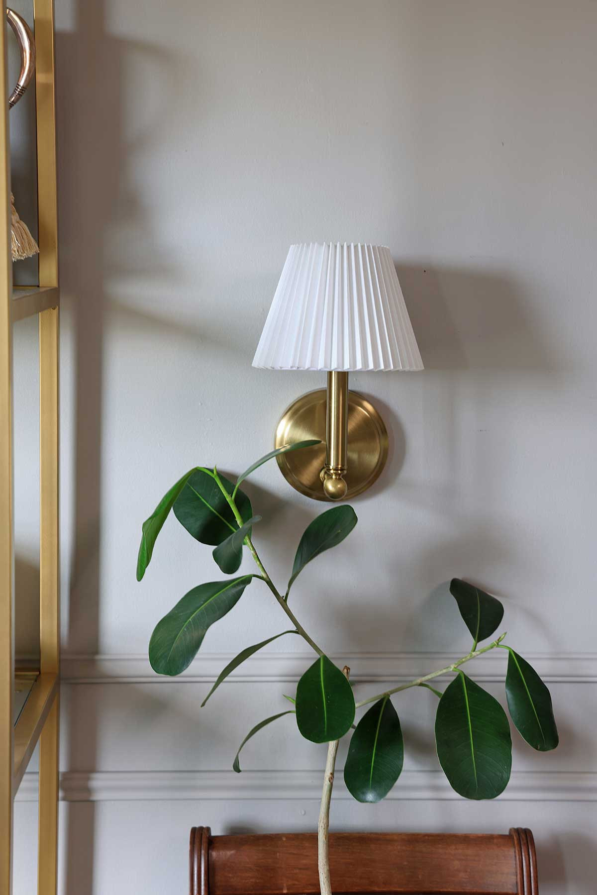 Incredibly charming brass sconce with pleated shade | The perfect little light fixture to fill an empty corner and add a little ambiance! | Shop this exact sconce, or some other beautiful options! 

 #LTKHome