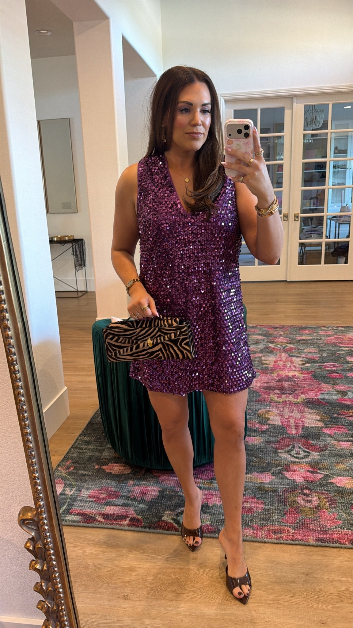 what i’m wearing for robbie’s birthday dinner! curvy midsize purple sequin dress 💜 size large! andddd obsessed with the zebra clutch