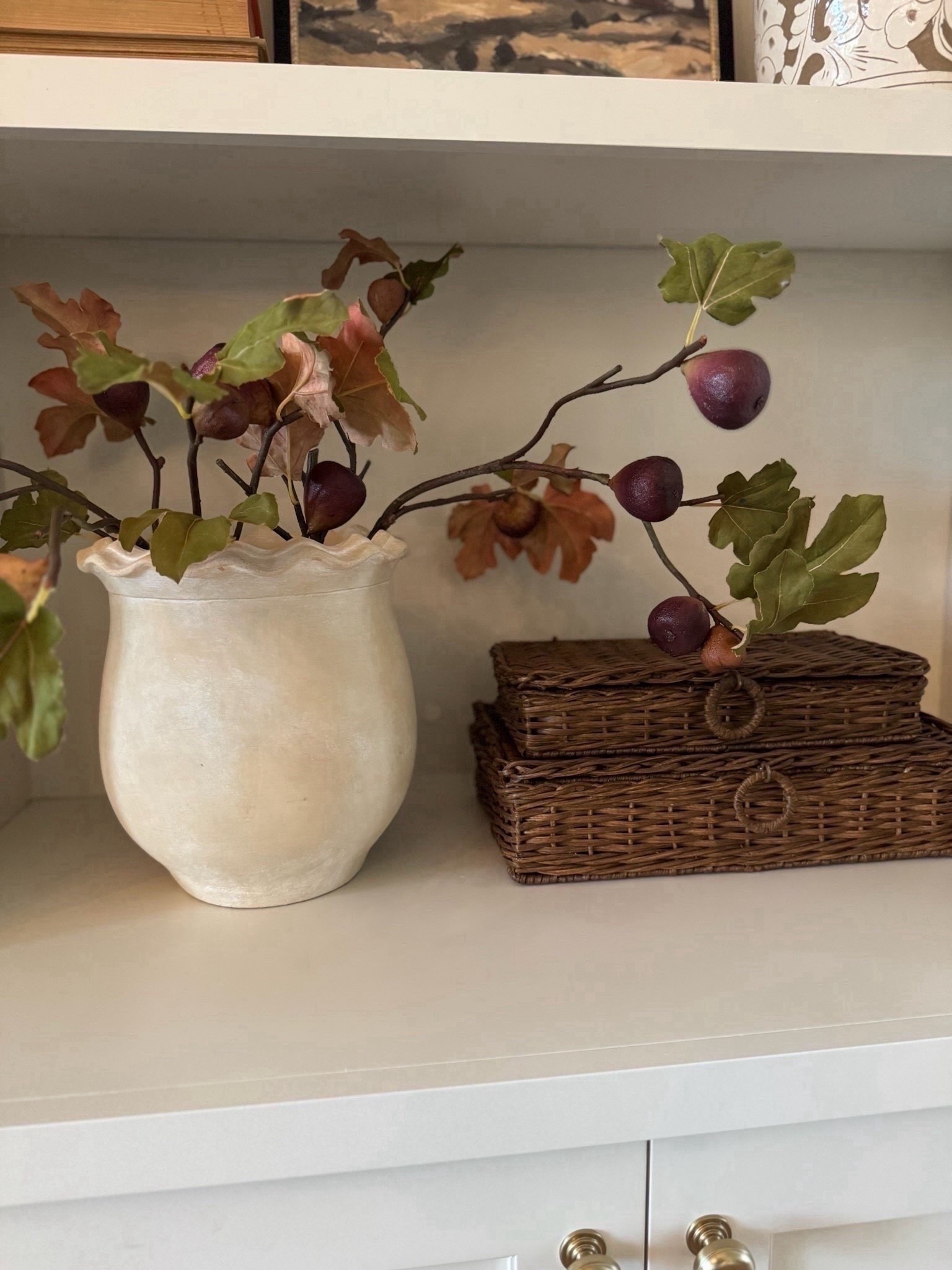 These faux fig branches just restocked at Afloral! They’re one of my favorite realistic branches to style in our home during the fall season. I have two in this pot and love the organic look!

#LTKHome