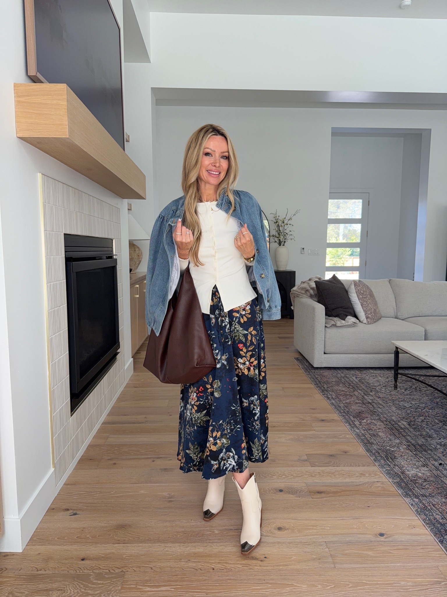 Amazon outfit idea if you want more outfits from fewer pieces. 🤎 comment AMAZON and I’ll send you tbr details 

Instead of buying something that only works one way, I love finding one piece I can style over and over — and this floral skirt is exactly that.

I paired it with a sweater and boots, a simple tank and jacket, an easy sweater-over-the-shoulders look, a fitted button-front top with denim, and even a basic tee for the most casual version.

Same skirt, five completely different outfits — which means less standing in your closet thinking you have “nothing to wear” and more mileage out of the pieces you already own.

Which styling is your favorite?

#amazonfashion #amazonoutfits #falloutfits #amazonfinds #affordablefashion