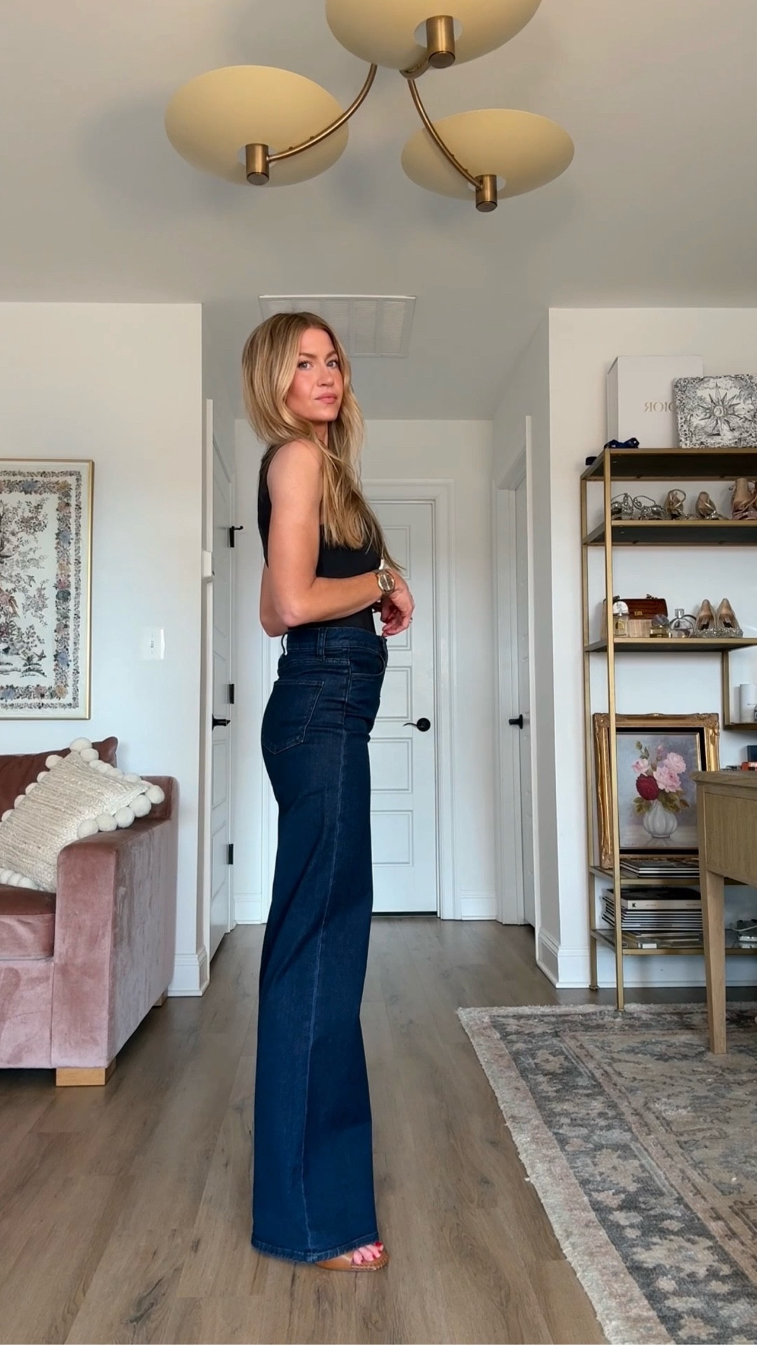 These high rise wide leg dark denim are so flattering and on sale! Run TTS, wearing a 25. 

Black tank top: TTS, wearing a S
Sandals: TTS 



#LTKSaleAlert #LTKootd #LTKgrwm