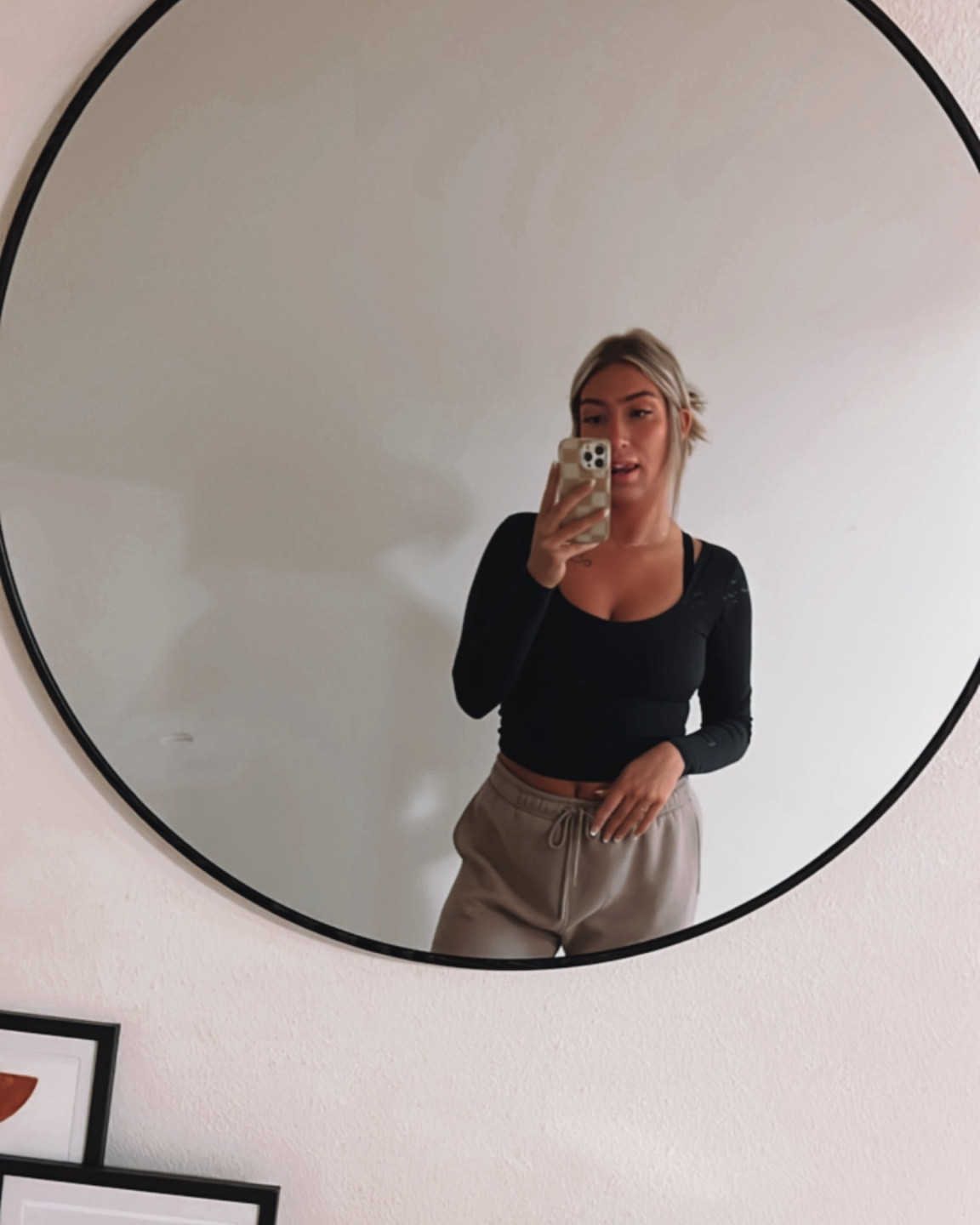 The perfect basic long sleeve black athleisure top - I’m telling you, it’s SO soft. Paired with some light brown sweatpants, we’re looking good on a lounge day! 

#LTKfindsunder50 #LTKfitness #LTKstyletip