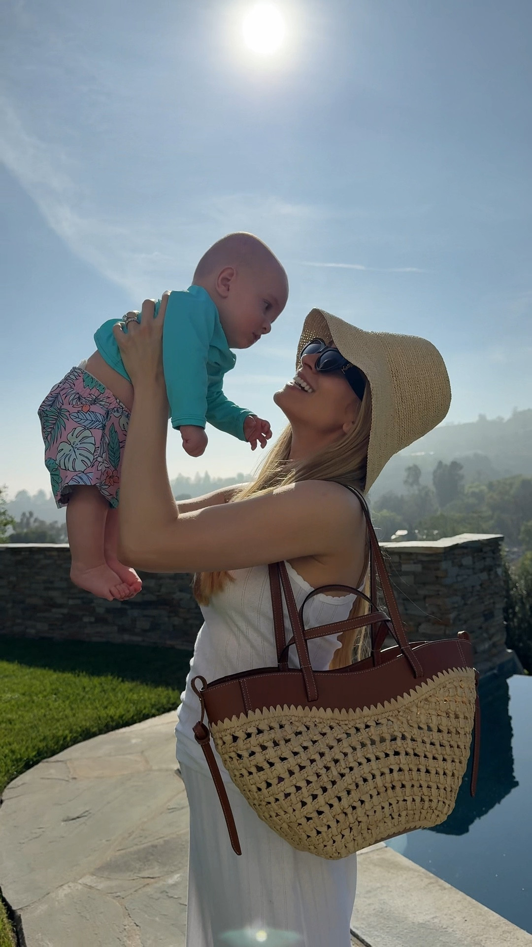 Celebrating 6 months of George & Allegra (how?!) with the twins’ first pool day - I hope they become water babies 🌊🥹Sweetest suits from @Quince   #quincepartner