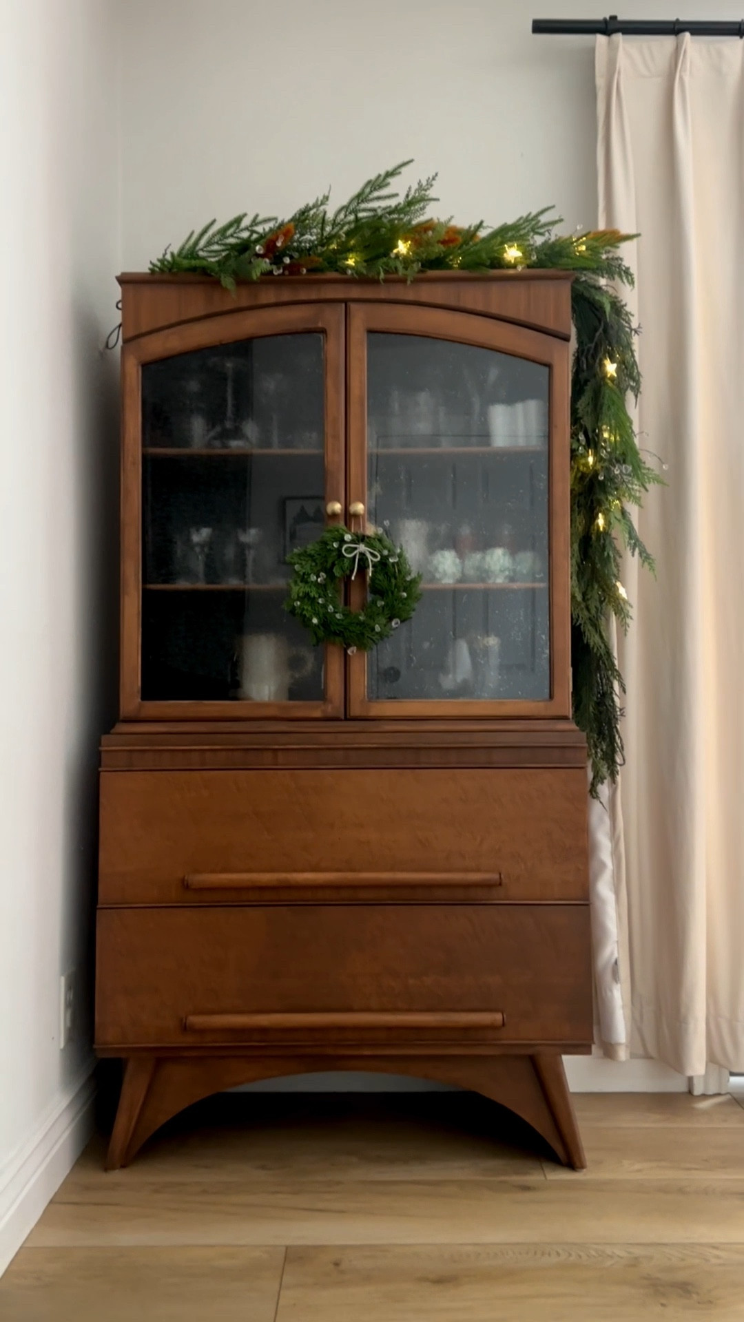 From start to finish the mid-century hutch revival is complete and all dressed up for the holidays! #midcentury #holidayhome #holidayhomedecor 

#LTKHoliday #LTKCyberWeek #LTKHome