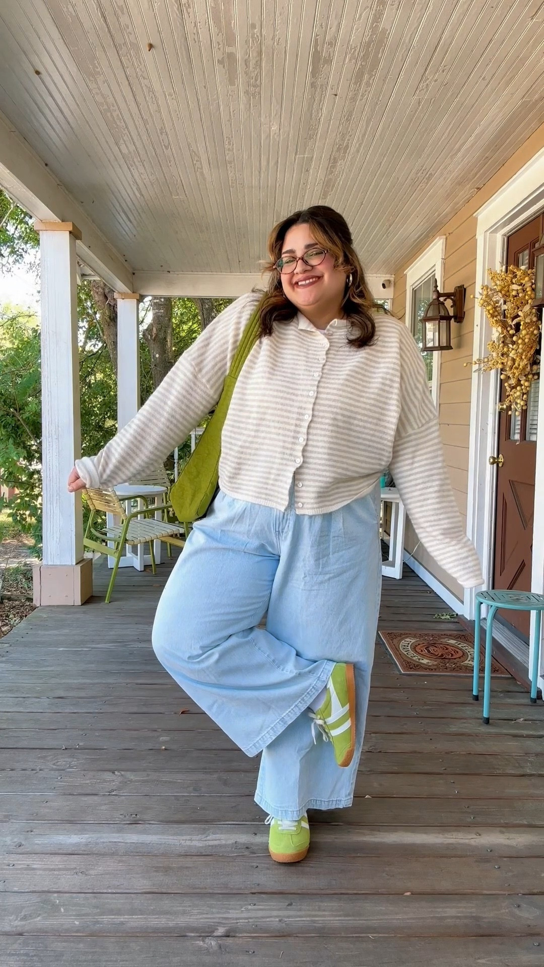 I love this outfit! Backless top, wide leg jeans, green Gola sneakers, striped cardigan and my trusty avocado Baggu 🥑 The cardigan is from Things Between, which is not linkable here! I am wearing an XL in the top and 16 in the jeans.

#LTKStyleTip #LTKMidsize #LTKSaleAlert