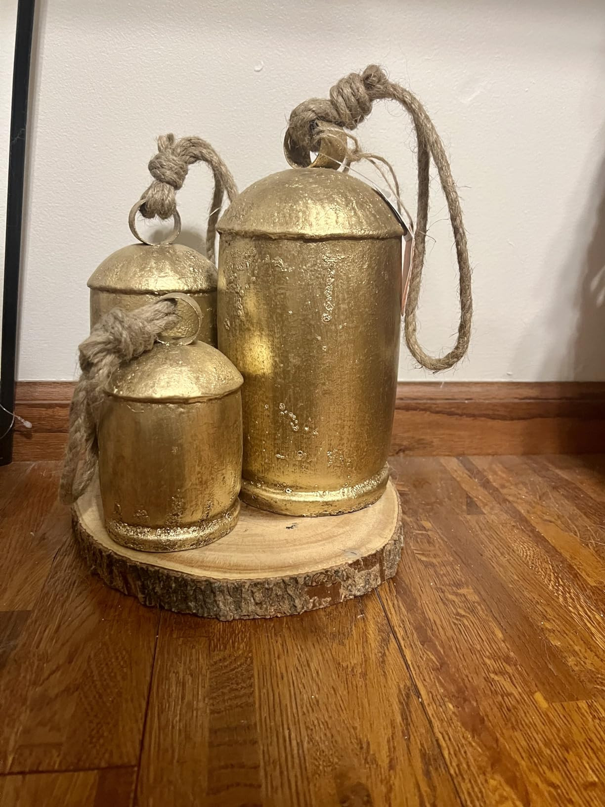 Deco 79 Metal Decorative Cow Bells Tibetan Inspired with Jute Hanging Rope, Set of 3 10",8",6"H, ... | Amazon (US)