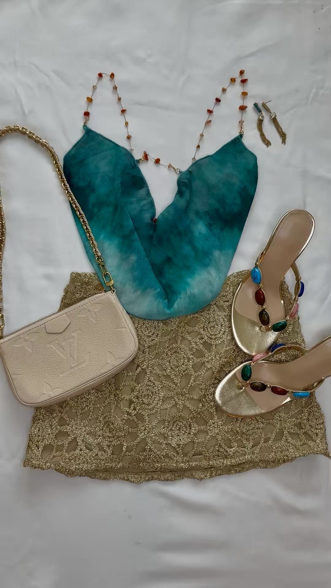 Amazon vacation outfit finds ✨ Turquoise + gold is the summer color combo I can’t stop wearing. I styled a turquoise halter top with a gold crochet mini skirt, statement sandals, and a neutral shoulder bag for the perfect beach dinner or resort night look.

This is such a good Amazon summer outfit for a tropical vacation, European summer trip, or your next beach getaway 🌴

Shop this look + more vacation outfits on my LTK 🤍 Save for inspo!

#LTK #LTKfashion #LTKtravel #amazonfashion #amazonfinds #amazonfashionfinds #amazonoutfit #vacationoutfit #resortwear #summeroutfit #beachvacation #vacationstyle