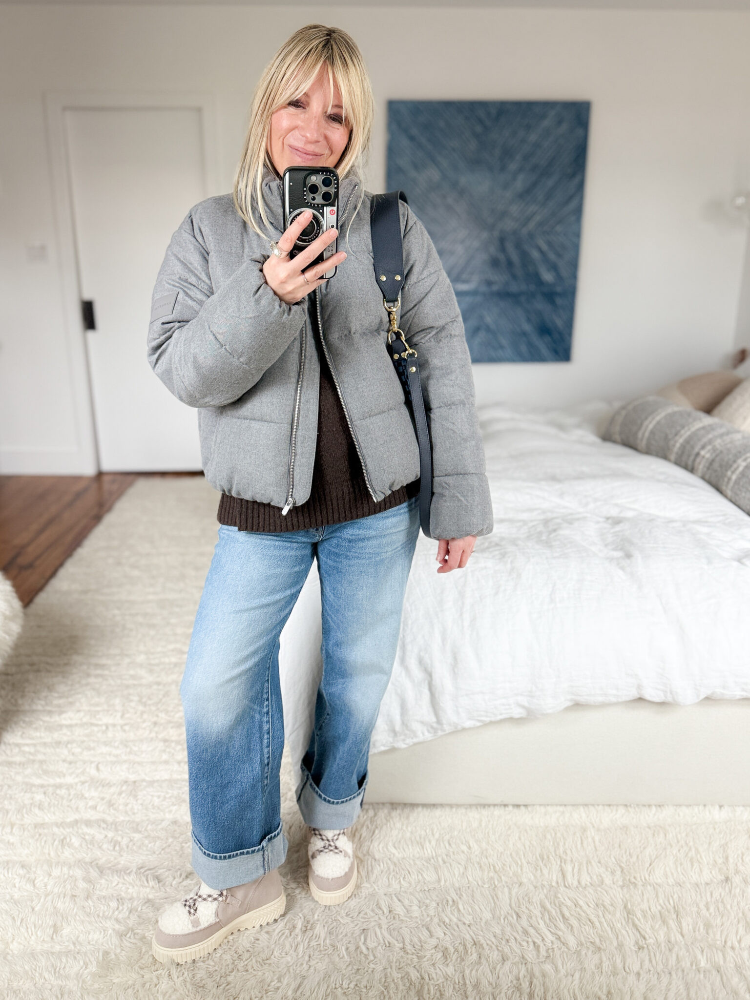 Athleta’s gray flannel puffer jacket is STILL 50% off!!! It's soooo pretty in person. The gray is soft to the touch with a lovely heathered look. When zipped, I can just tuck my cozy sweater inside and it stays put, comfortably. 

 #LTKootd