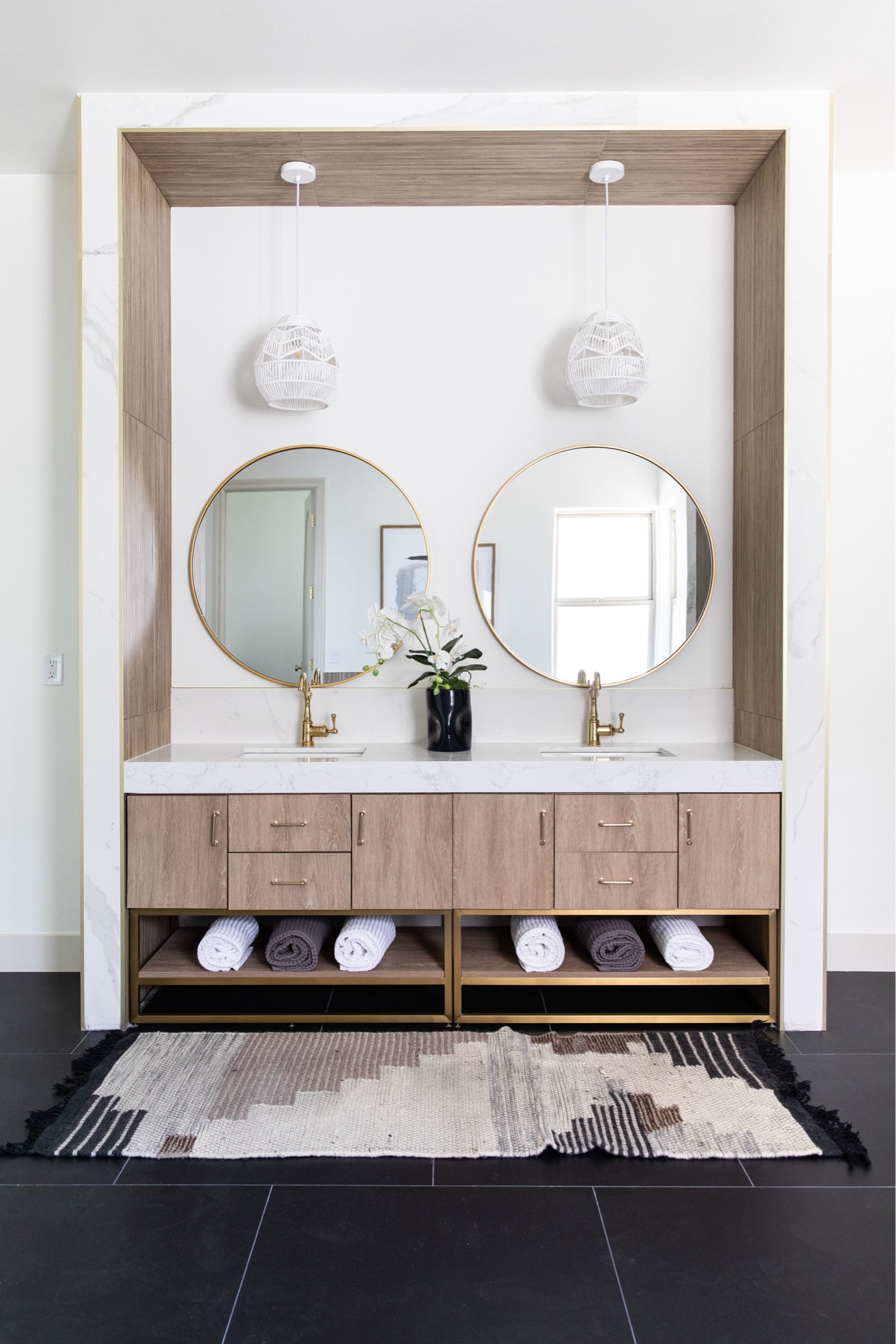 Prefabricated vanity with a custom treatment that elevates the look while keeping things affordable. #BathroomVanity #BathroomDesign.

#LTKHome