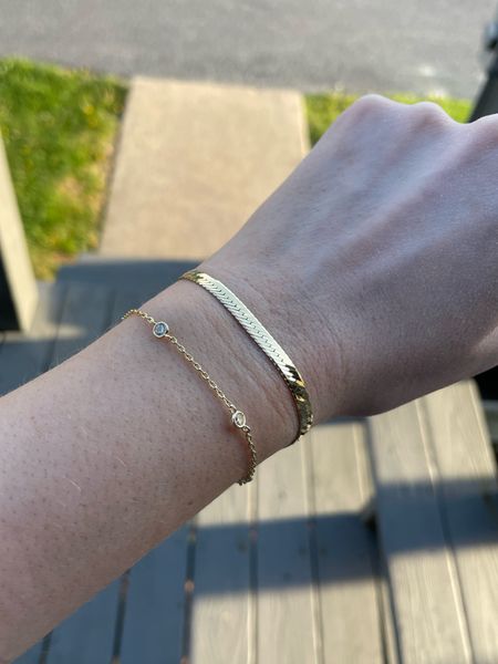 Bracelet stack - linking a very similar herringbone bracelet from amazon! 
.
Amazon finds station bracelet golf bracelet 

#LTKSeasonal #LTKstyletip #LTKfindsunder50