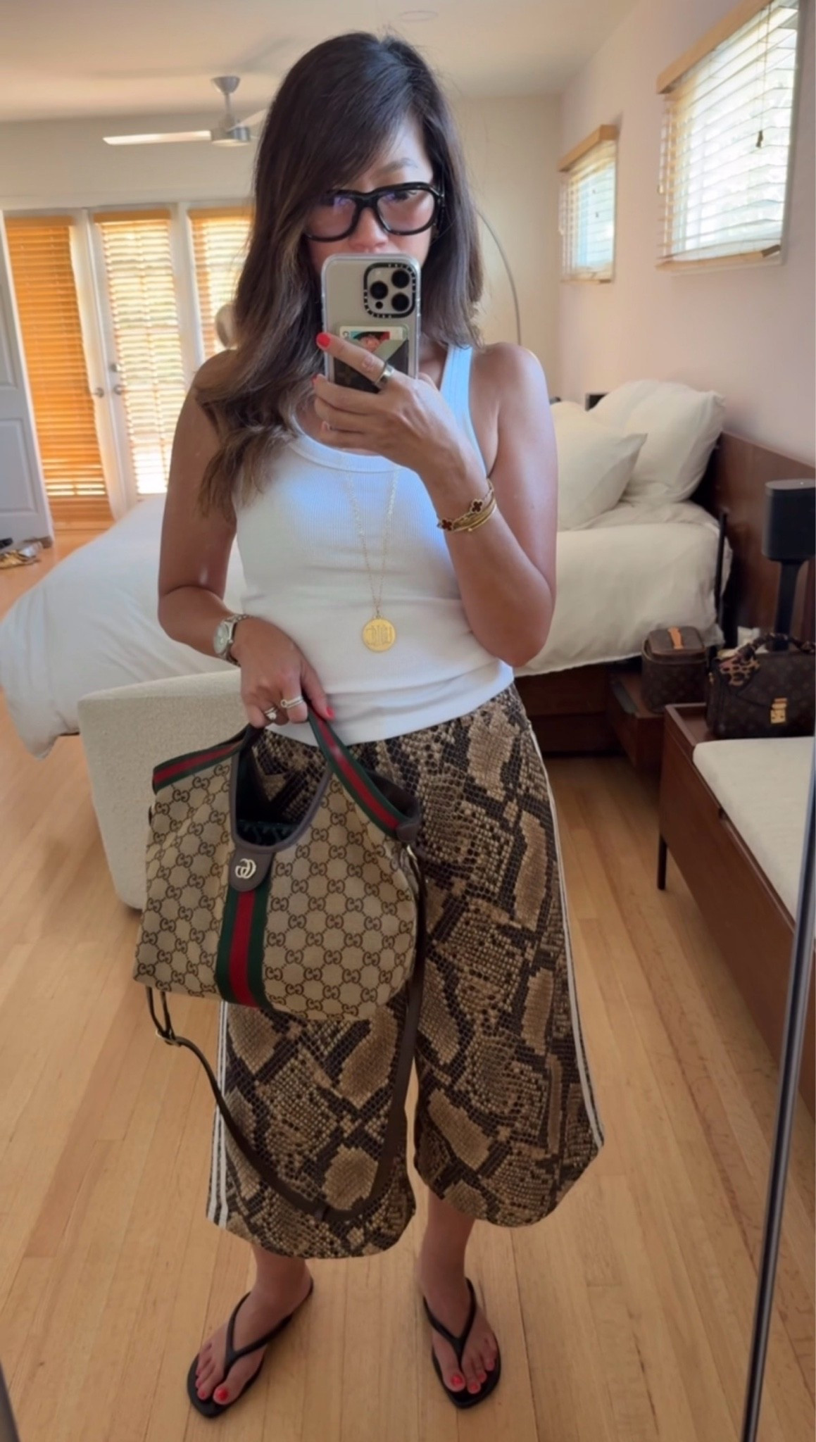Mixing prints is one of my favorite ways to make a simple outfit feel a little more elevated. A classic white tank keeps everything balanced while the accessories pull it all together. 🐍✨

#LTKdayinmylife #LTKootd #LTKmomlife